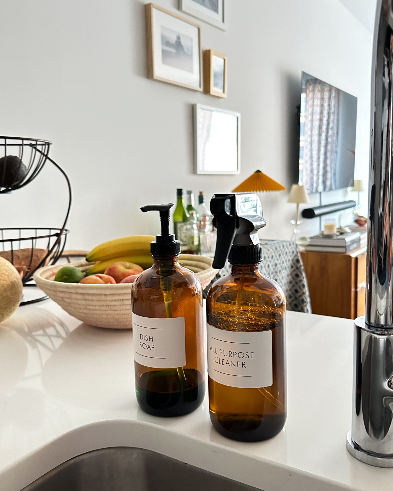 I finally replaced the ugly, branded and mismatched soap bottles around my sink with uniform amber glass bottles with minimalist labels. It made such a big impact - the bottles look crisp and clean on my counter. 

I searched high and low to find the right amber bottles. It was surprisingly hard to find one source with both spray and pump. I read a lot of reviews to find bottles that worked properly with no leaking or corrosion (hence why I went with plastic over metal).

The bottles don’t come with good labels so I found sources for those too. There’s an etsy store that prints and ships labels, and all you have to do is stick on. Or, like I did, you can print your own. This is a bit more of an investment upfront but so useful to have. 




Kitchen styling, countertop styling, kitchen accessories 

#LTKHome