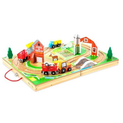 Melissa & Doug 17-Piece Wooden Take-Along Tabletop Farm, 4 Farm Vehicles, Play Pieces, Barn, Grain House: Fine Motor Skills | Target