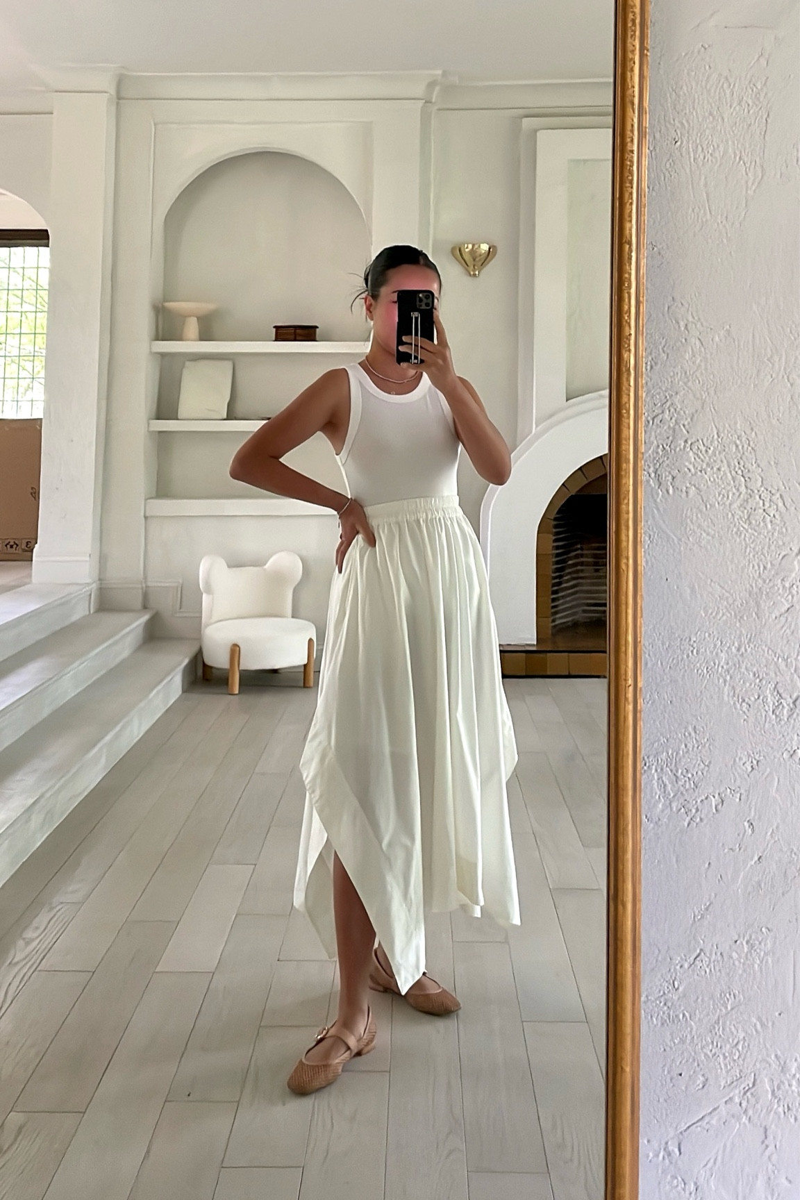 Comfortable and elegant look for summer! This handkerchief skirt has pockets, is lightweight, and petite-friendly!

The fabric has great movement! Might also get it in black too and pair it with boots in the fall!

For size reference, I'm 5 ft 105 pounds and wearing a @gap Petite XS in the skirt and XXS in the tank top

#ad #howyouweargap