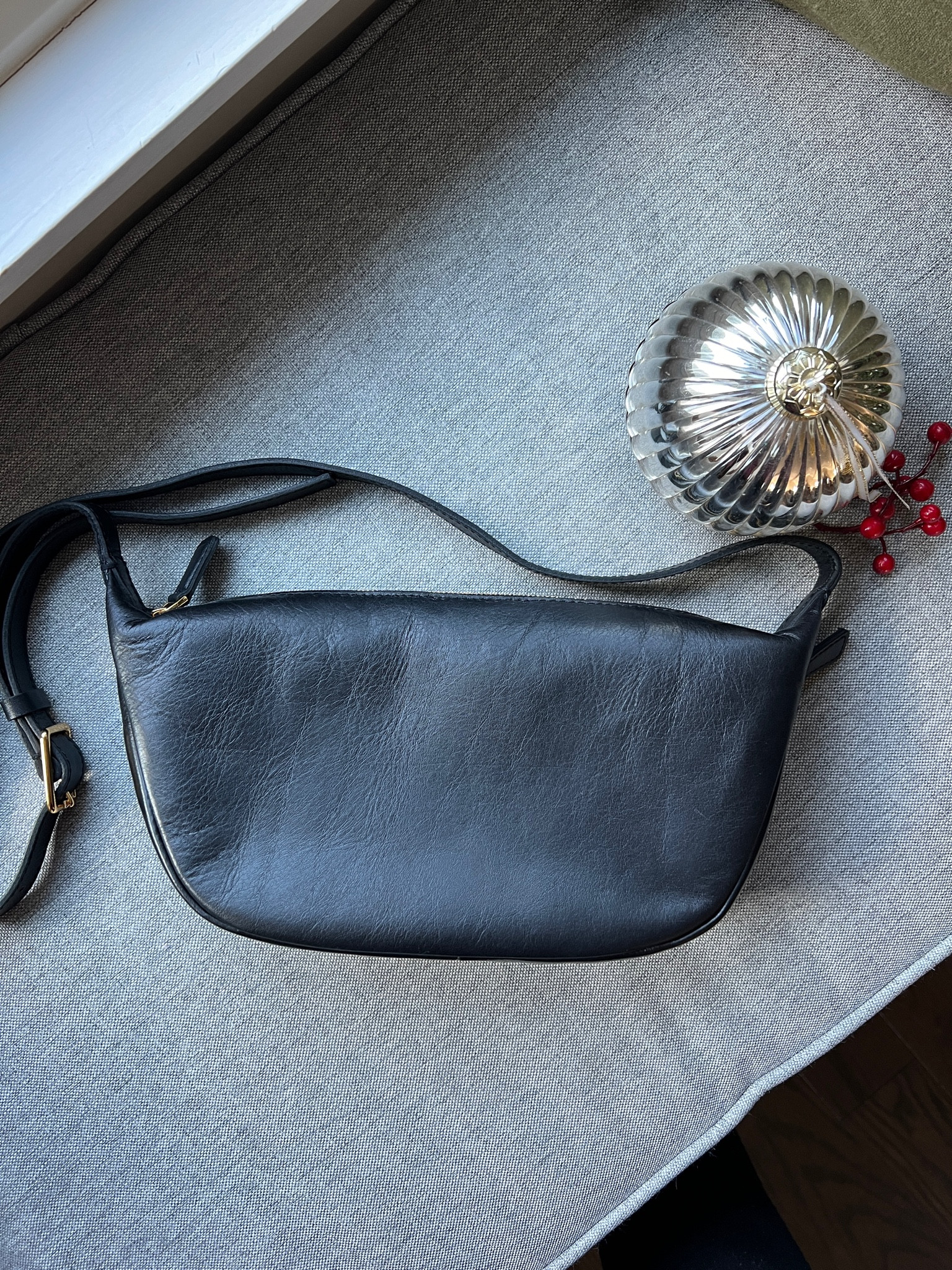 Leather crossbody bag.  Gold zipper details. 

#LTKSaleAlert #LTKStyleTip #LTKGiftGuide