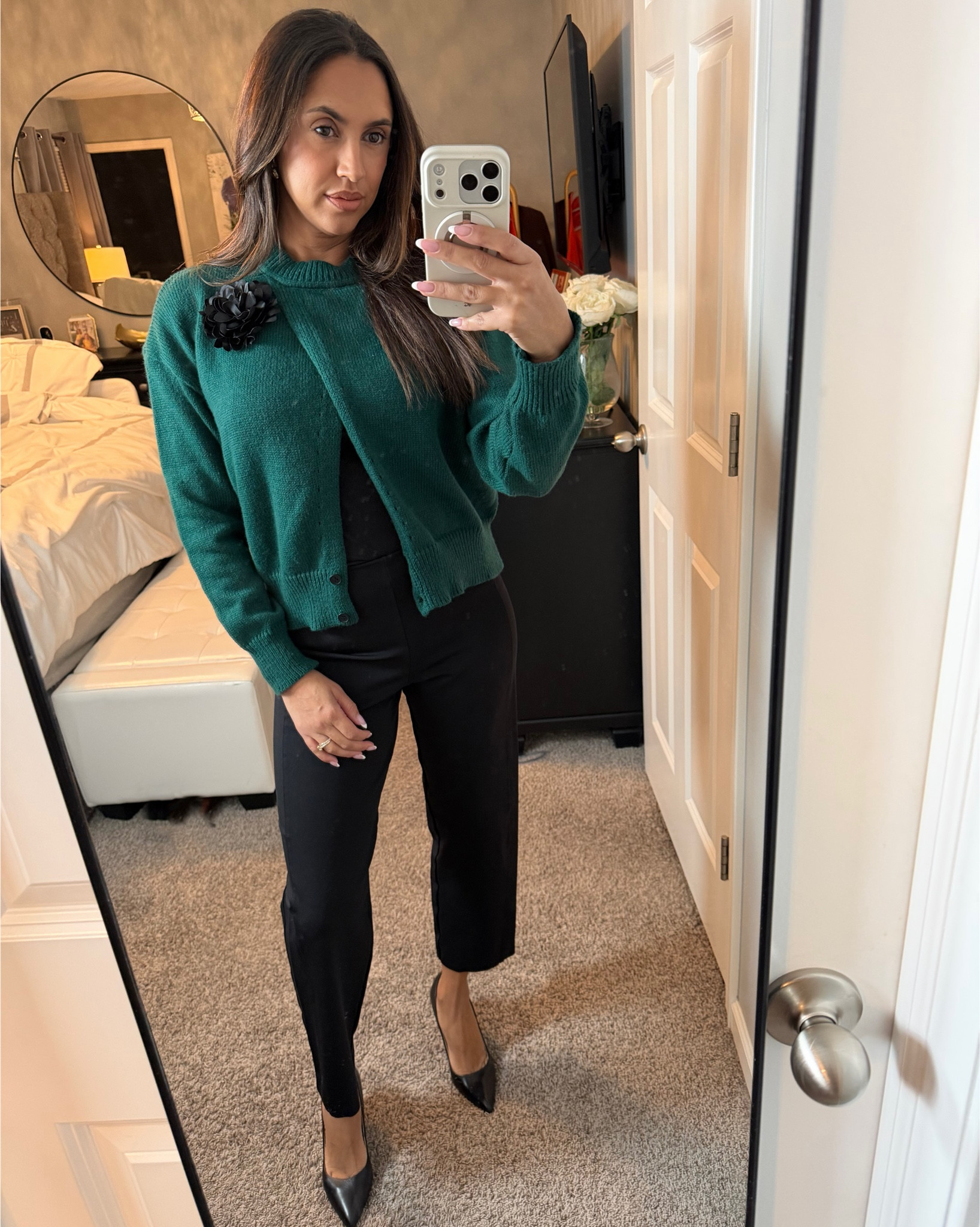 St Patrick’s Day but for the office 💚🖤 This green sweater with 3D floral accent, together with a classic pair of black pants are a perfect combo to keeping it classy and professional while still showing a bit of holiday spirit🍀

#LTKootd #LTKOver40 #LTKWorkwear