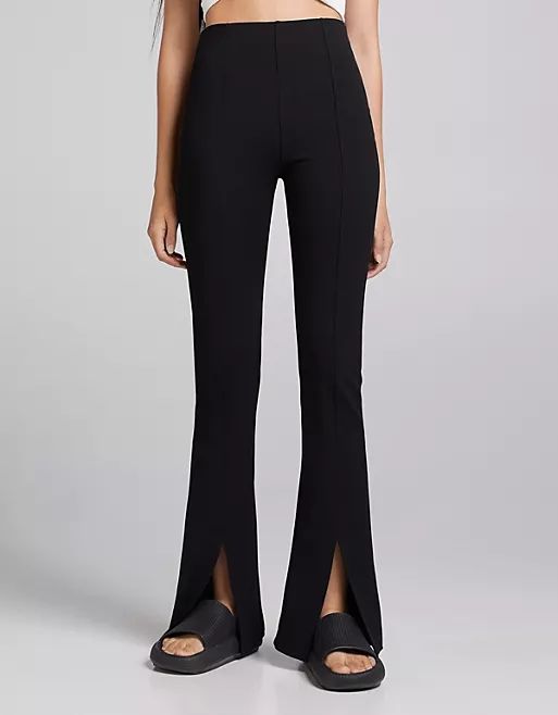 Bershka slit hem flares in black | ASOS (Global)