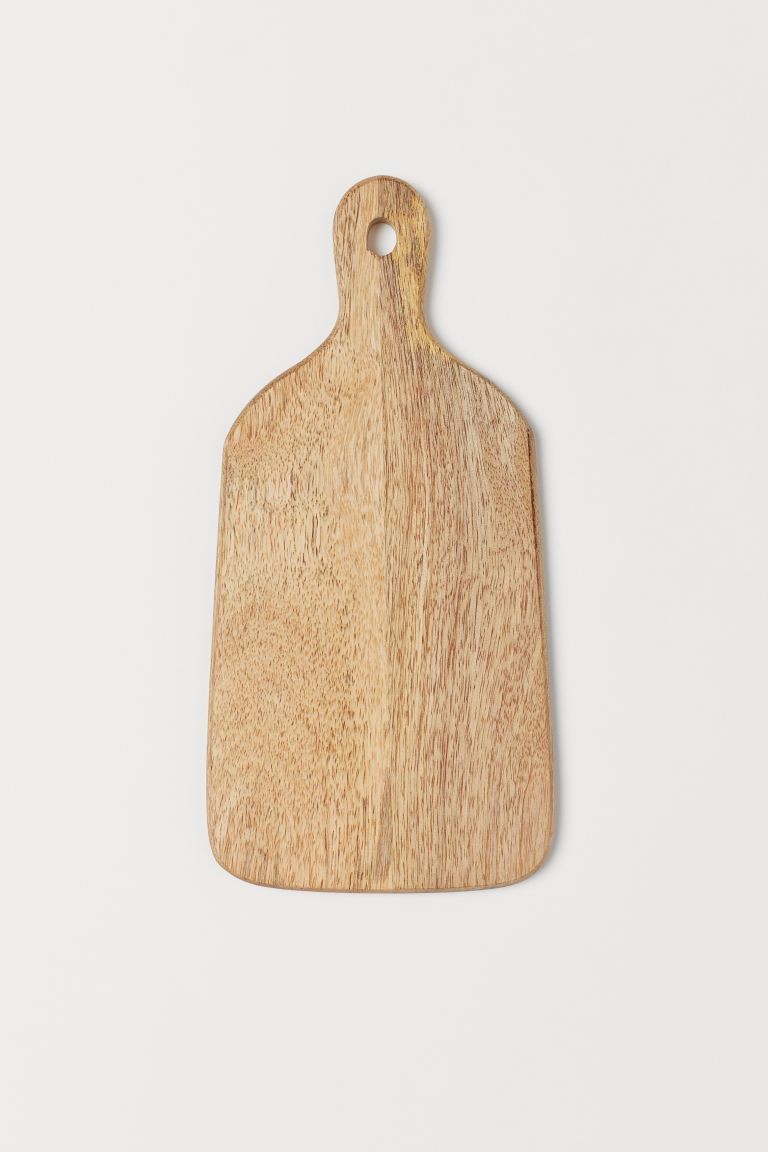 Small cutting board in mango wood with a handle. Size approx. 5 x 10 1/4 in. | H&M (US + CA)