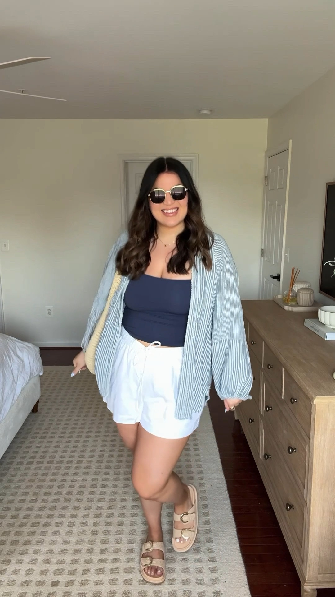 Midsize vacation outfit! Wore this outfit last week while in 30A for a breakfast/coffee run! Love how light weight both the top & shorts are! And both are on sale right now. You can save 30% off the top with the code: SUNSHINE30 + shorts you can save with the code: SHORTSAF

Tank - xl (same tank in blue) 
Top - large 
Shorts - xl 
Sandals - 9.5 
Bag is from Abercrombie last summer, added similar options 


Midsize, midsize outfit, summer outfit, summer fashion, summer style, vacation outfit, vacation style, aerie top, Abercrombie shorts, midsize shorts, linen shorts, summer, midsize style, size 12, size 14 


#LTKSeasonal #LTKMidsize #LTKSaleAlert