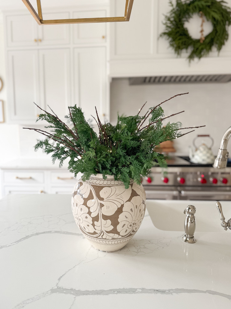 Obsessed with me new cream and white vase - I have it styled on my kitchen island with faux cedar stems and battery operated light up branches. 

 #LTKHoliday #LTKSeasonal #LTKHome