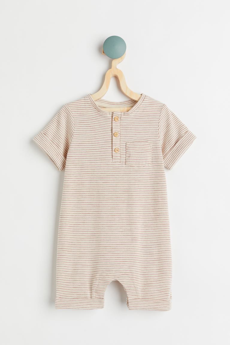 Conscious choice  New ArrivalBaby Exclusive. Romper in soft organic cotton slub jersey with a but... | H&M (US + CA)