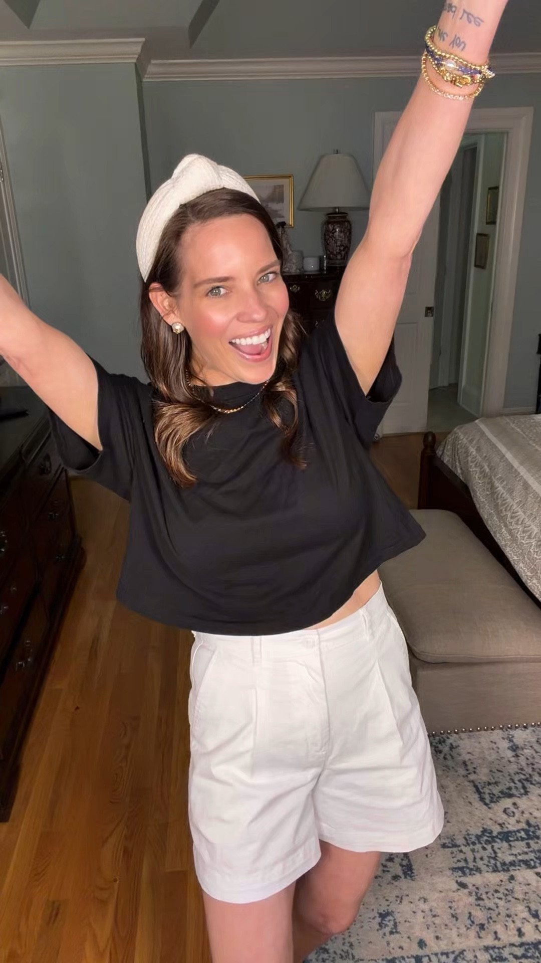 Effortless Summer Outfit 🤍 Boxy Black Tee + White Shorts + Colorful Accessories


This boxy crop tee is the definition of an elevated basic 🖤 Made from 100% organic cotton and crafted in the USA, it has that perfect heavyweight feel while still being breathable for warmer days. I love the relaxed, slightly cropped fit—it pairs so effortlessly with high-waisted shorts for a clean, flattering silhouette.

Styled it here with classic white shorts for a crisp summer look 🤍 and added a pop of personality with colorful beaded jewelry and the cutest mesh ballet flats 💙 The sheer blue flats with embroidered details are such a fun statement piece and surprisingly easy to wear! Finished it off with a mini jelly tote for that playful, coastal vibe 🐚

This is one of those outfits you can throw on and instantly look polished but still feel completely comfortable—perfect for everyday errands, lunch, or casual summer plans ☀️

summer outfit ideas, boxy crop tee outfit, organic cotton t shirt made in usa, black tee outfit women, white shorts outfit summer, casual chic summer style, preppy summer outfit, colorful jewelry stack, beaded bracelet trend, mesh ballet flats outfit, jelly tote bag outfit, effortless everyday style, elevated basics outfit

#LTKPetite #LTKOver40 #LTKSaleAlert