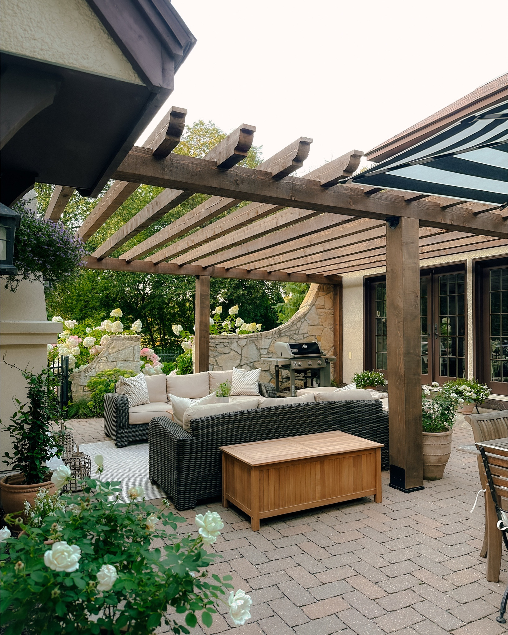 Our outdoor teak storage and coffee table are on sale! They add a Nancy Meyers feel to our patio while giving us function. I love how they look — much more elevated than other outdoor plastic storage deck box. 

#LTKSaleAlert #LTKHome #LTKSeasonal