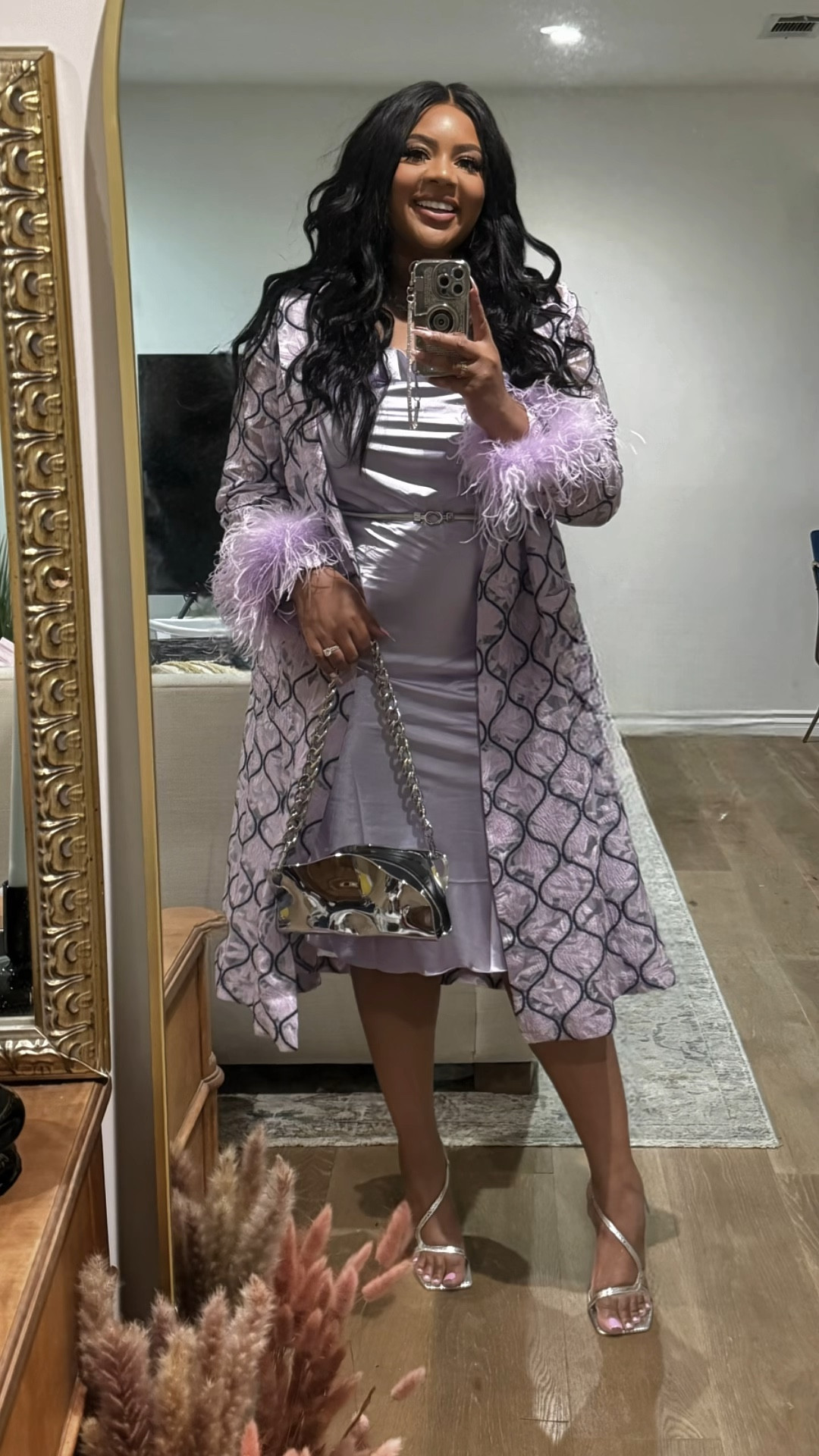 A lavender mood for dinner with the girls.  💜Obsessed with my new chrome Published By Mayzie bag and this sheer trench with feathers from the always stunning Andreeva Official. 
This chic little lilac dress is an Amazon find! Tied together with a silver waist belt from Amazon! 

#LTKMidsize #LTKStyleTip #LTKFindsUnder50