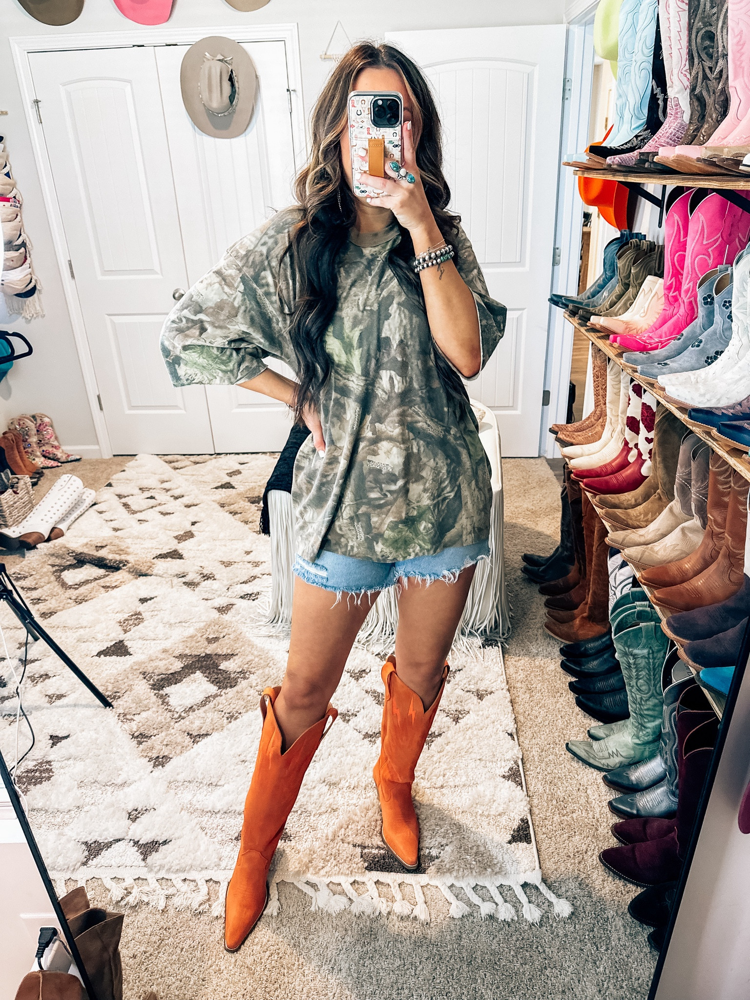 Camo tee ,denim cutt off shorts and orange cowgirl boots 

#LTKStyleTip #LTKFindsUnder100 #LTKFindsUnder50