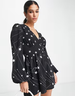 ASOS DESIGN bubble crepe plunge neck romper with puff sleeve in mixed star print | ASOS (Global)