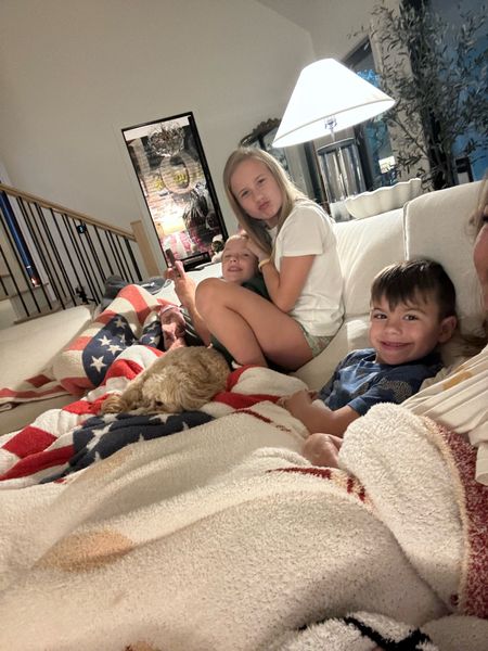 cozy movie night with my sweet family! our favorite sports blankets are back in stock along with the perfect american flag blanket in stock for the summer holiday!

#LTKKids #LTKFamily #LTKHome