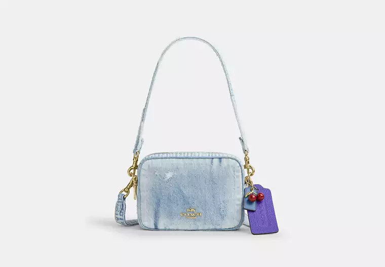 Coach Outlet Mini Carey Crossbody Bag In Loved Denim With Charms - Blue, Size: Small | Coach Outlet US