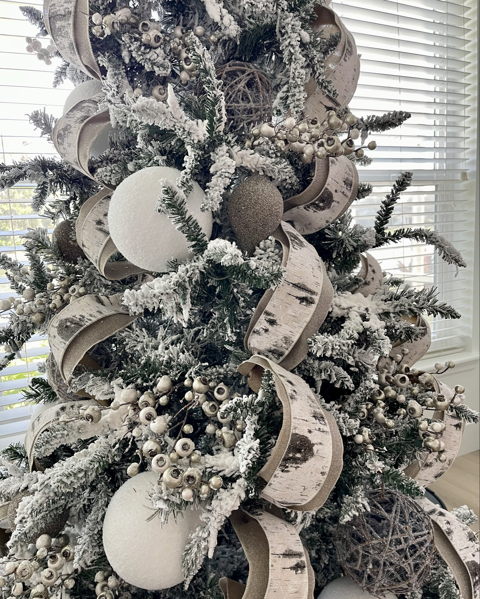 This tree give warm, cozy winter vibes.  The birch ribbon is so beautiful. If you look closely, it has a subtle sparkle to it and the light bounces off of it. Just stunning.
.
.
.
.
.
#snowychristmas #birchribbon #birchchristmasdecor #christmasdecor #christmasdecorations #christmastreeideas #christmastree #decoratingforchristmas #snowychristmasdecor #flockedtree #holdmyeggnog #flockedchristmastrees 

#LTKStyleTip #LTKSeasonal #LTKHome