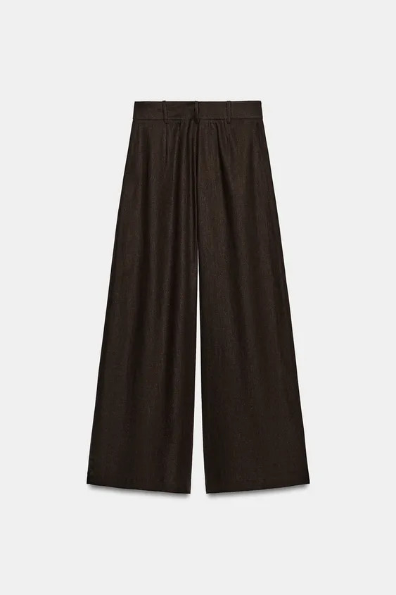 Model height: 178 cmHigh-waist trousers made of linen blend. Wide-leg fit with front darts. Front... | Zara IT