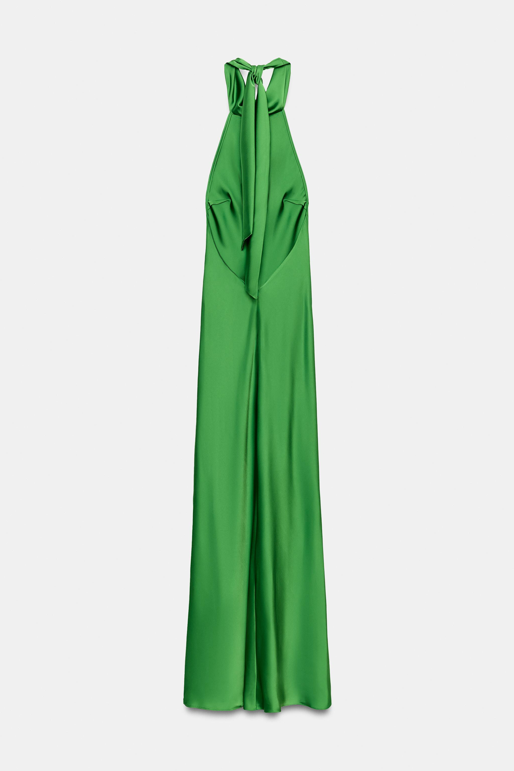 Long dress in satin fabric. Featuring an adjustable high halter neck with tie fastening and an of... | Zara UK
