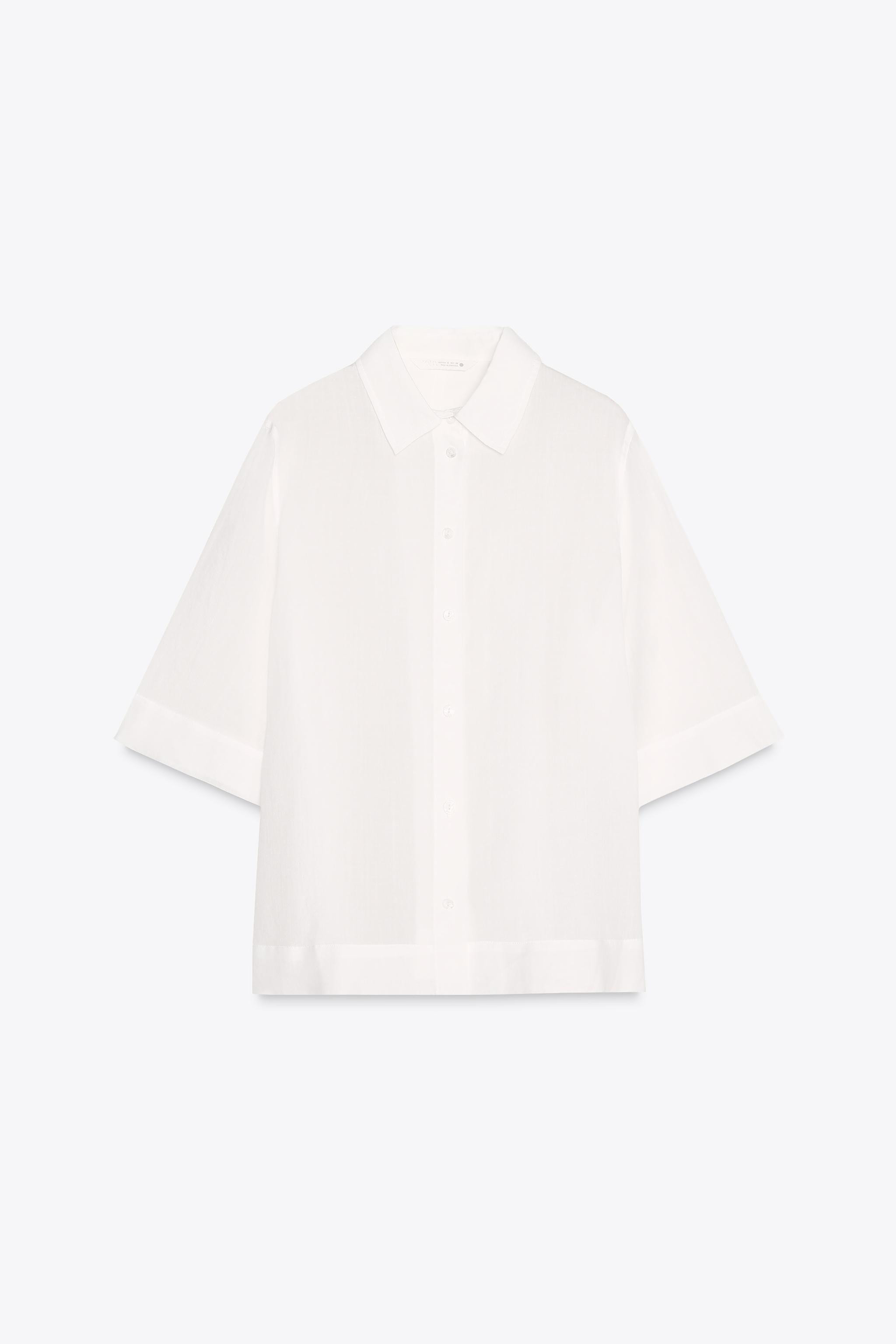 ZARA WOMAN COLLECTIONShirt made of lyocell and ramie yarn. Lapel collar and short sleeves. Straig... | Zara US