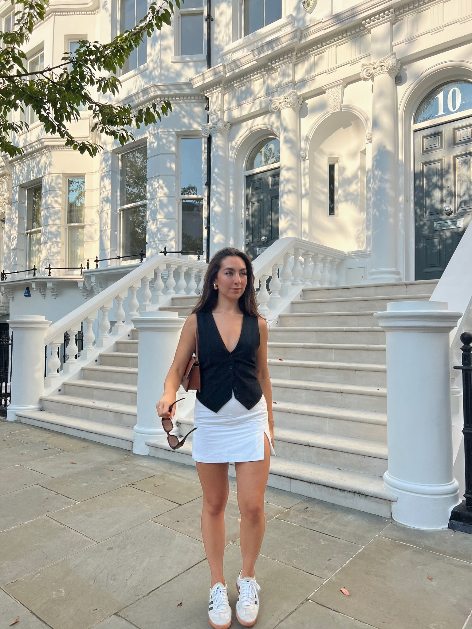 Monochrome outfit, white mini skirt, linen skirt, mini skirt, waistcoat, black waistcoat, women’s waistcoat, adidas trainers, Handball Spezial, brown leather bag, brown shoulder bag, weekend outfit, Arket, Pull & Bear, Abercrombie & Fitch, & Other Stories, H&M, COS, Anthropologie

#LTKSeasonal #LTKstyletip #LTKeurope