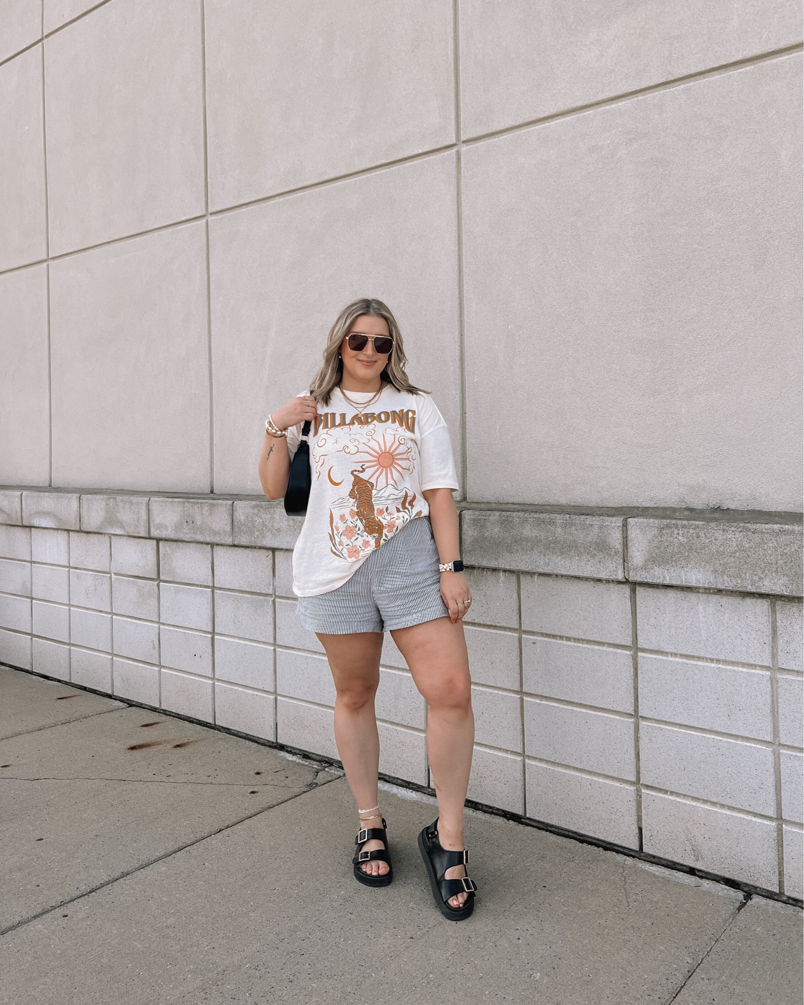 Comfy casual midsize summer outfit - boxer shorts (these are fully lined and have pockets!), oversized graphic tee (linked similar, chunky black sandals


#LTKcanada #LTKsummer #LTKmidsize