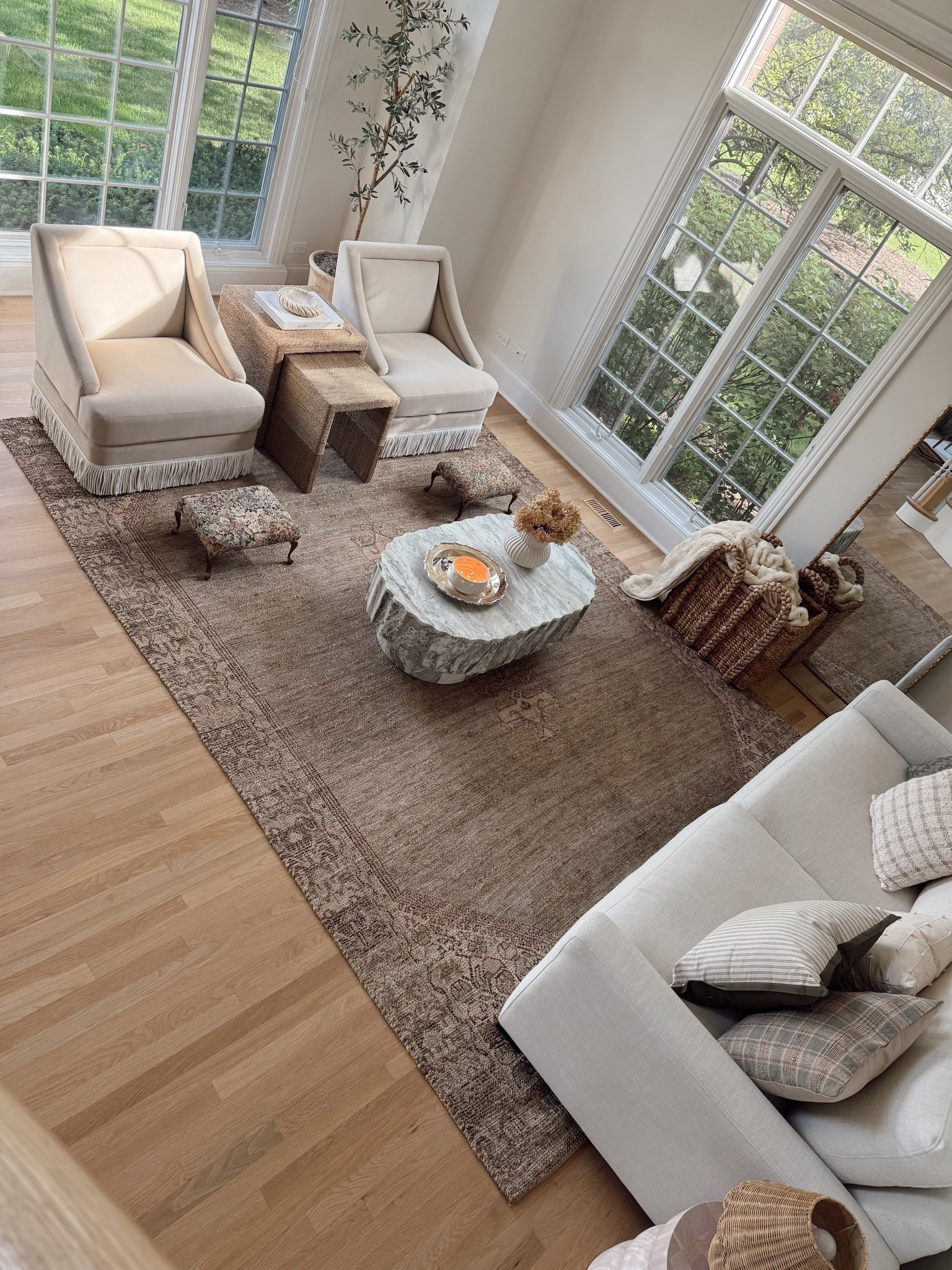 Excited to share this new and beautiful collection from @magnolia by @joannagaines x @loloirugs 😍 I have never had a jute style rug before but have always wanted one! This one is the Oakley Jute blend rug in Sage/Wheat and I love how it ties my whole room together! 🫶🏼😌 This is the 8’6” by 11’6” size here in our sitting room. Also added these gorgeous pillows from the collection. The green earthy undertones just feel so cozy and a great welcome to Fall! 

#joannagainesxloloi #magnoliahomexloloi #falldecor #interiorstyling #arearugs #rugs

#LTKHome