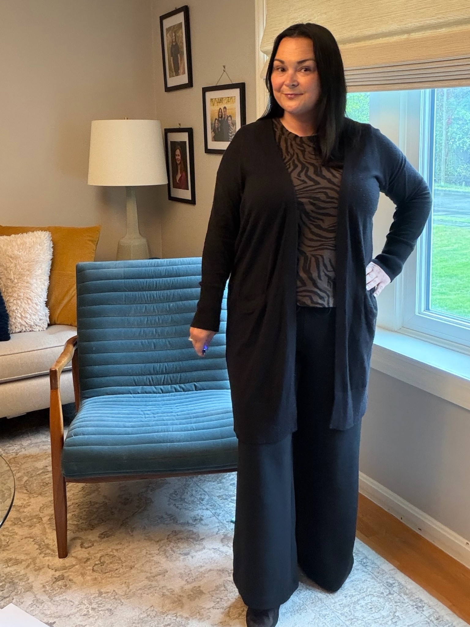 Wore this to school and for an entire day I was comfortable and able to move around like I needed to. 
Everything is TTS: black wide leg pull on pants, zebra striped tank, long black cardigan (linking similar), and mesh sling backs.

#LTKootd #LTKMidsize #LTKWorkwear