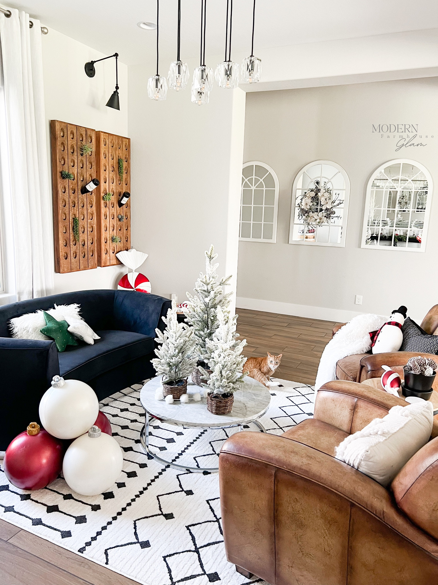 Barrel Room at Modern Farmhouse Glam 
Furniture, rug, couch, black velvet, loveseat, leather chair, marble coffee, table, Christmas tree, wine, bottle holder, lighting, mirrors, ball ornaments, Christmas decor  home 

#LTKhome #LTKsalealert #LTKFind