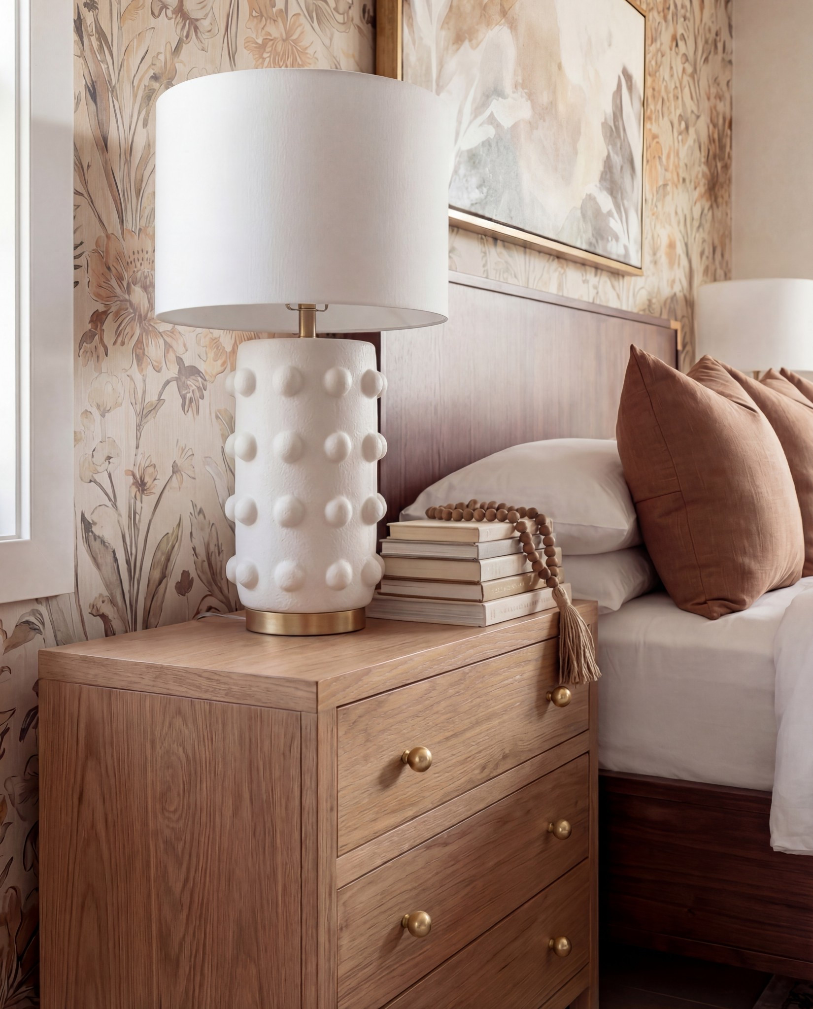 Bedroom Refresh : Shop The Look.
• Warm floral wallpaper
• Dark wood panel bed with brass accents
• Caramel velvet throw pillows
• Chunky knit camel blanket
• Neutral bouclé curved stools
• Sculptural white ceramic table lamps
• Vintage-pattern neutral area rug
• Natural wood nightstands
• Abstract warm-toned wall art above the bed

#LTKFindsUnder100 

#LTKHome #LTKSaleAlert