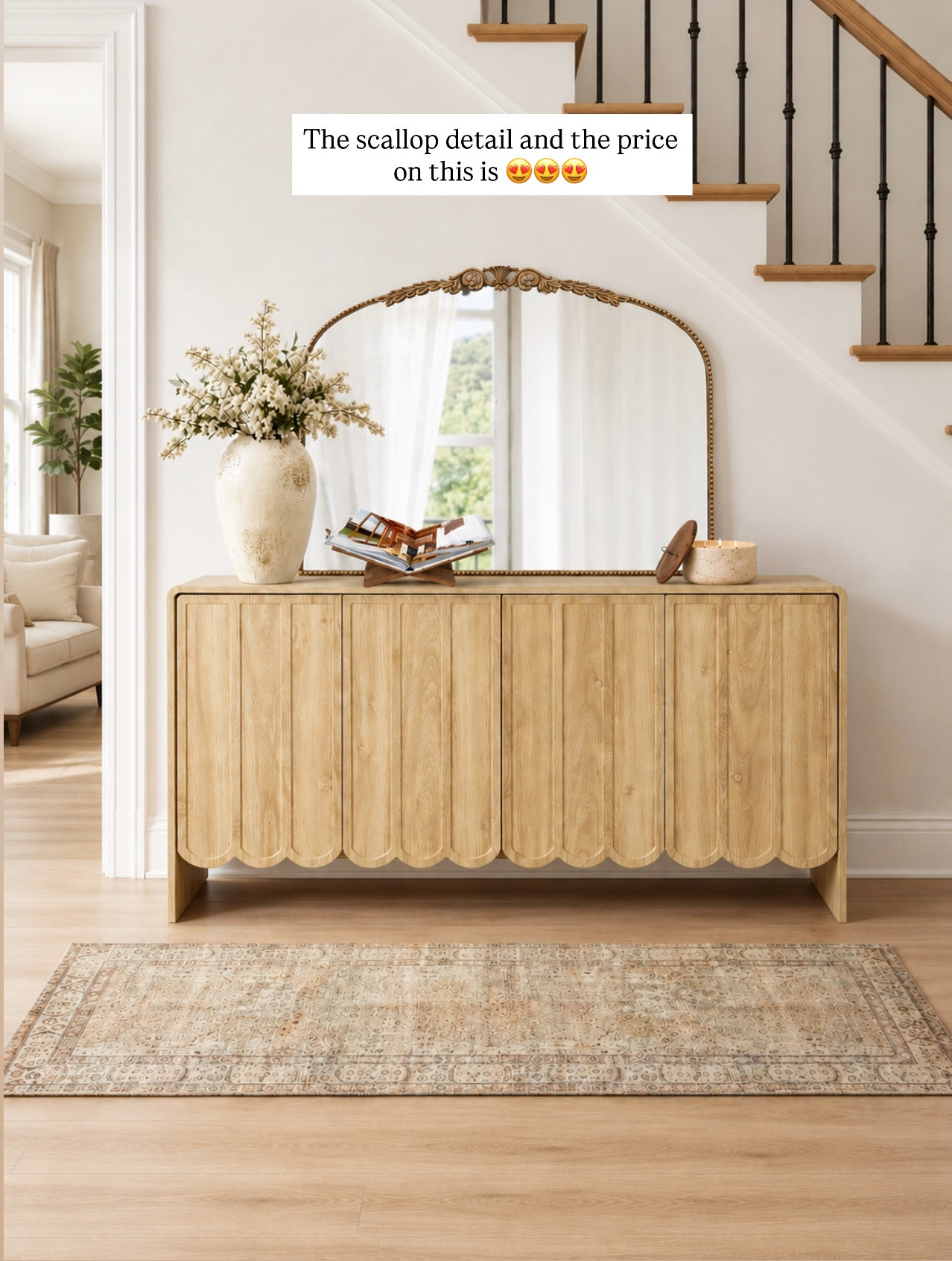 Loving the look of this sideboard! The scallop detail is my favorite part, plus the price is amazing. 

 #LTKHome #LTKSaleAlert