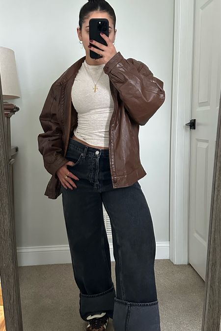 The jacket was thrifted so I don’t have the exact link! But the jeans are true to size for a baggy fit (I’m a size 25) and the top I get in an XS so it’s super tight ! 