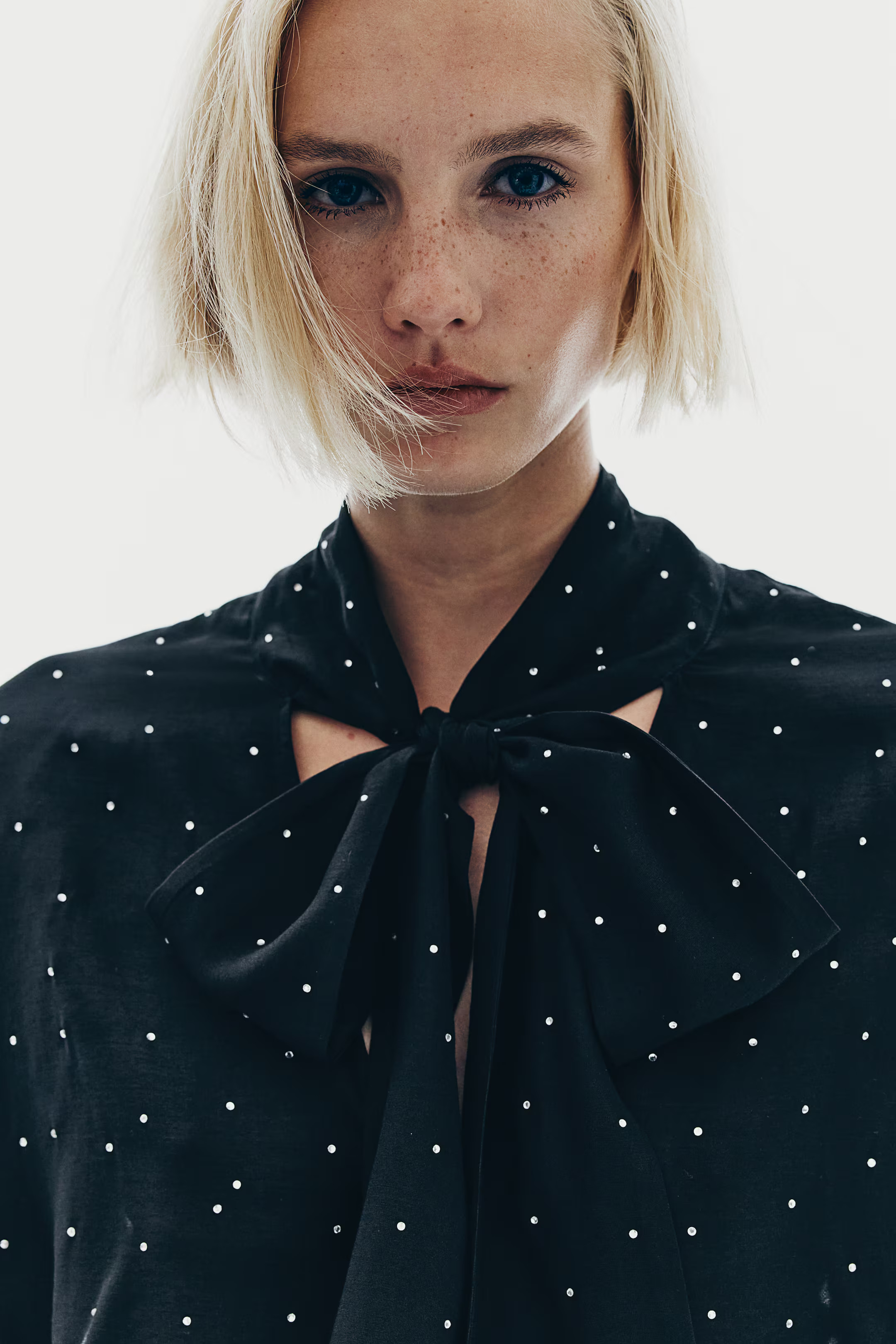 Rhinestone-embellished tie-neck blouse | H&M (UK, MY, IN, SG, PH, TW, HK)