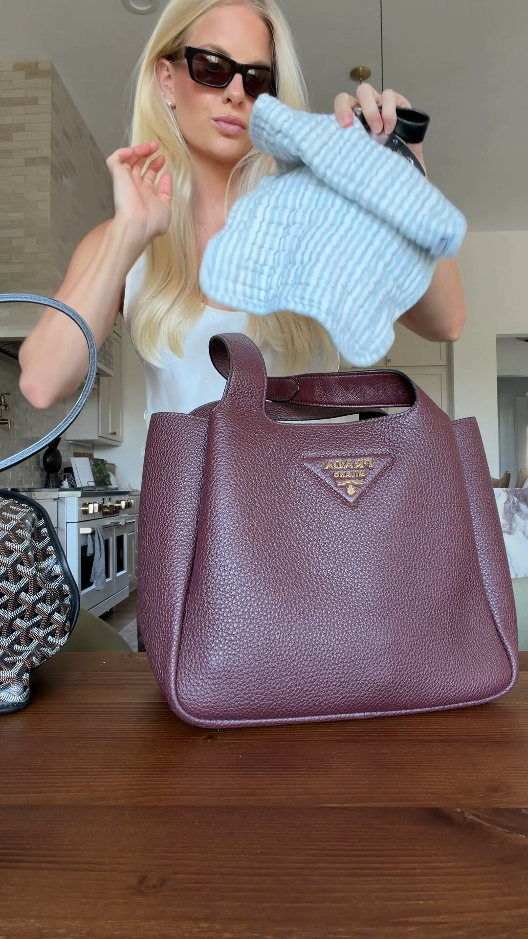 SIZE: 2/M in top, small in pants. Linking exact prada bag, now out of stock. Linking mini version of bag + a similar color in the correct size! More affordable similar options linked as well. #kathleenpost 

chic mom style, diaper bag, newborn lifestyle, elevated everyday outfit

#LTKootd #LTKmomlife