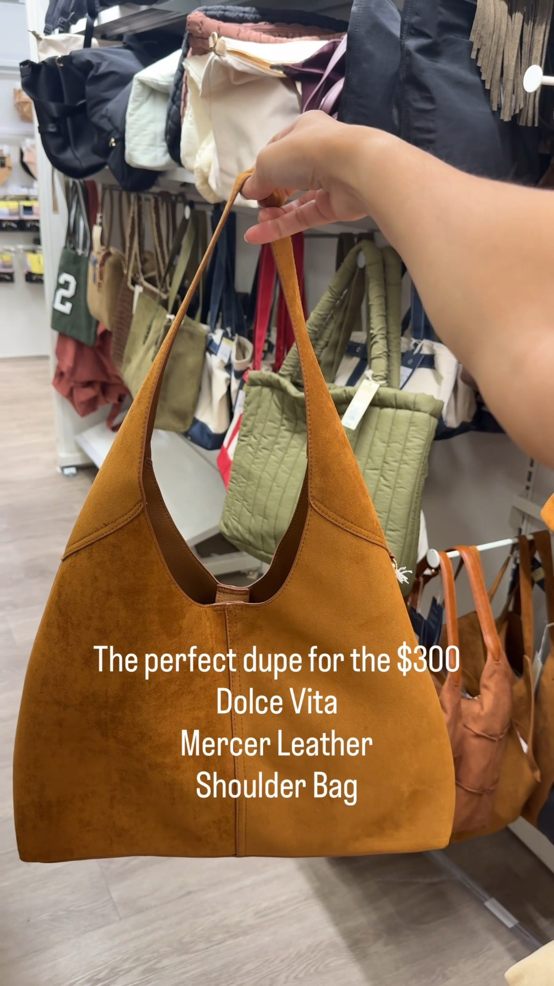 This Target bag is giving designer fall style without the designer price. 🍁

If you love the look of the Dolce Vita Mercer Leather Shoulder Bag,- ($300), this affordable Target find has that same relaxed, slouchy silhouette and rich suede-look finish for fall.

The warm cognac brown is perfect with denim, sweaters, boots, workwear, and everyday fall outfits. Such a good find if you’re searching for a brown suede shoulder bag, affordable designer-inspired handbag.

#LTKSeasonal #LTKOver40 #LTKdayinmylife