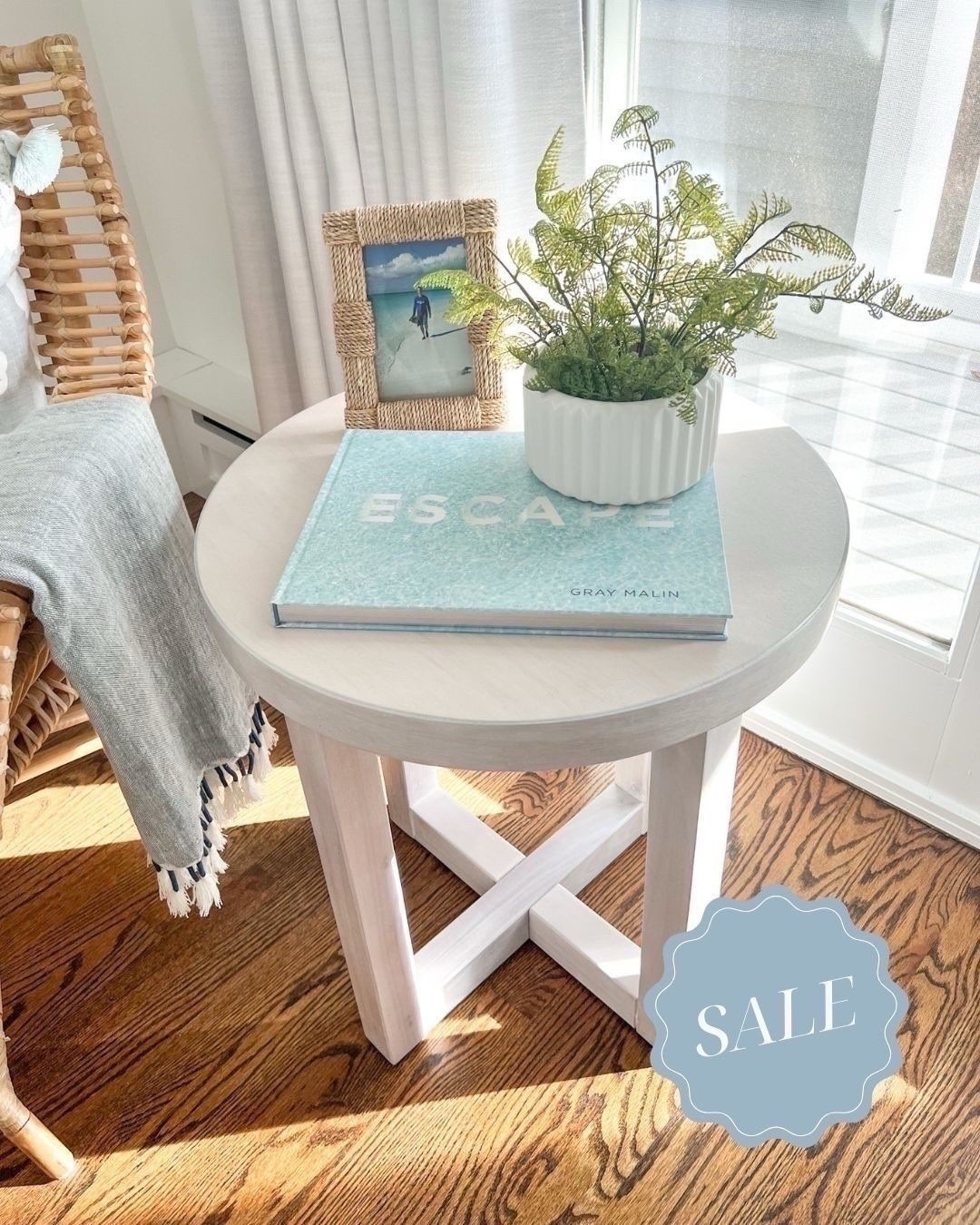 This little side table has been a great addition to our bedroom sitting area & is on sale for Labor Day!

-
coastal home decor, coastal decor, living room furniture, bedroom furniture, nightstand, end table, round side tables, light wood side tables, side tables under $150, side tables under $200, affordable side tables, beach house furniture, bedroom side table, light wood side table, bedroom sitting area, coastal coffee table books, amazon coffee table books, woven picture frames, photo frames, blue coffee table books, woven chair, bedroom chair, rattan chair, Serena & Lily Venice chair

#LTKHome #LTKSaleAlert