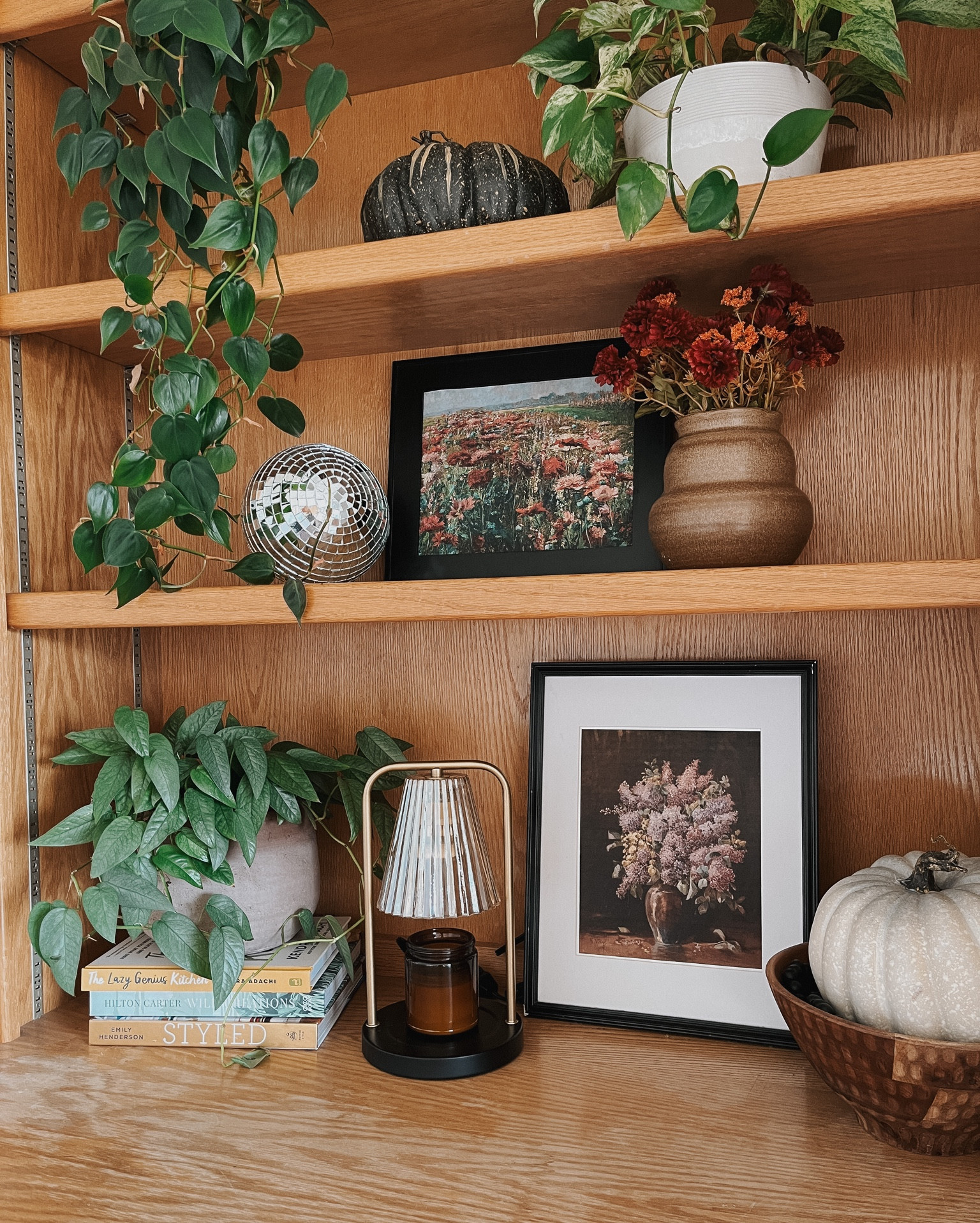 Fall shelf styling with my Walmart faux pumpkins and candies warmer lamp

#LTKhome #LTKSeasonal