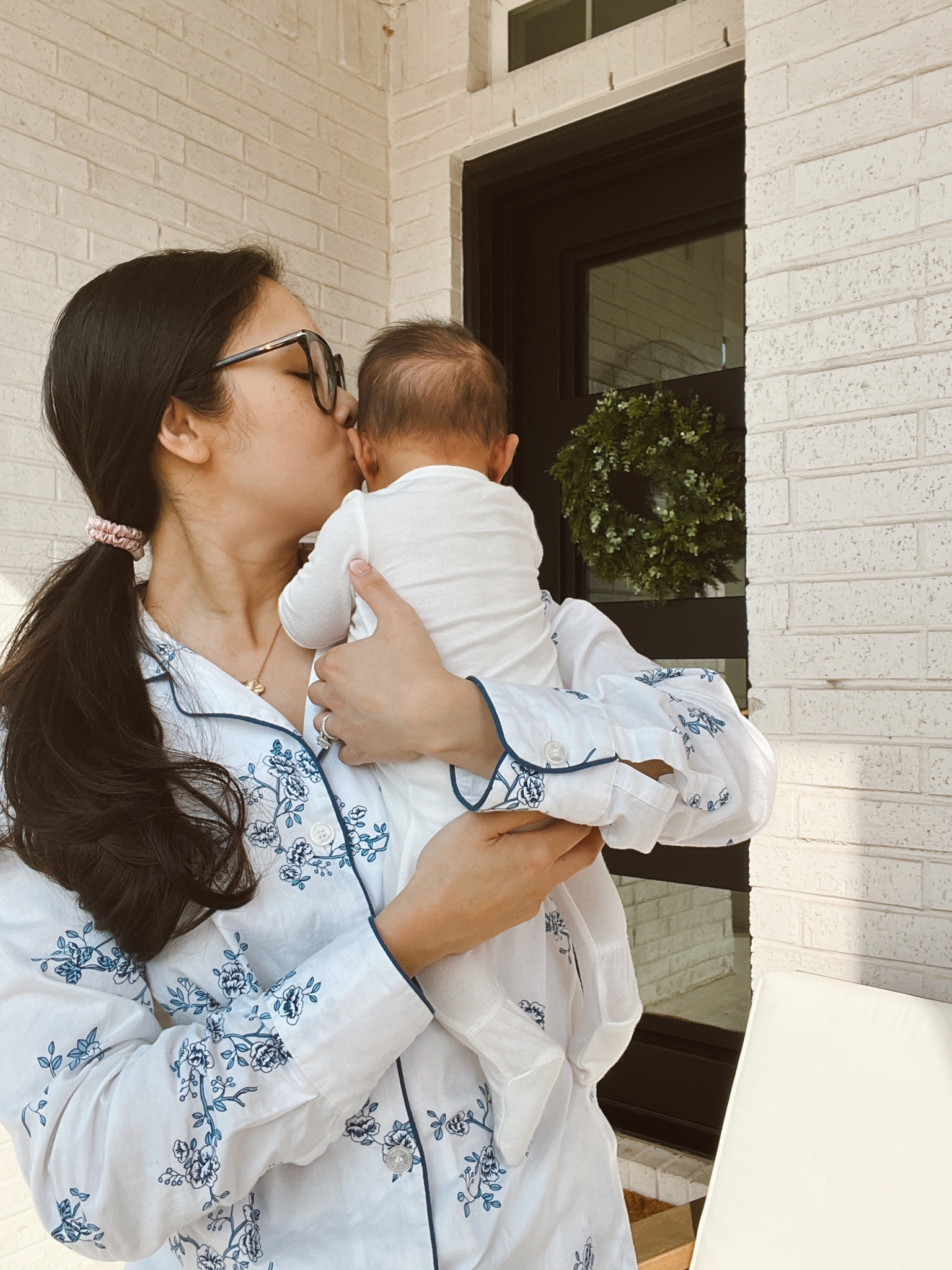 Blue floral print pajamas for Mom that are great postpartum. Love the button front for easy nursing and pumping access. Baby girl is wearing Kyte baby footies in cloud in preemie size  

#LTKfamily #LTKstyletip #LTKbaby