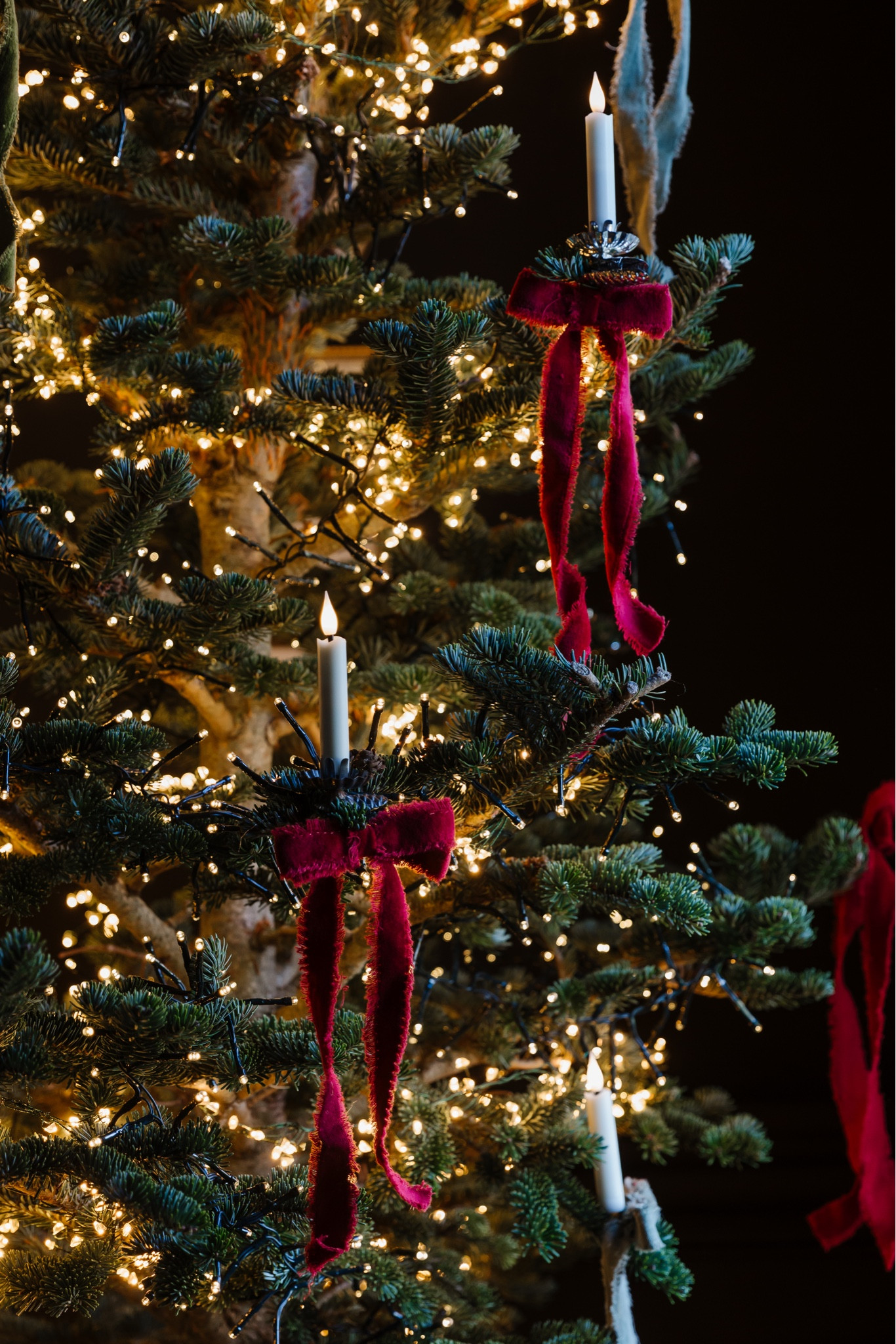 Simple tree with ribbon and candles. 🎀🕯️#LTKhome

#LTKHoliday #LTKSeasonal