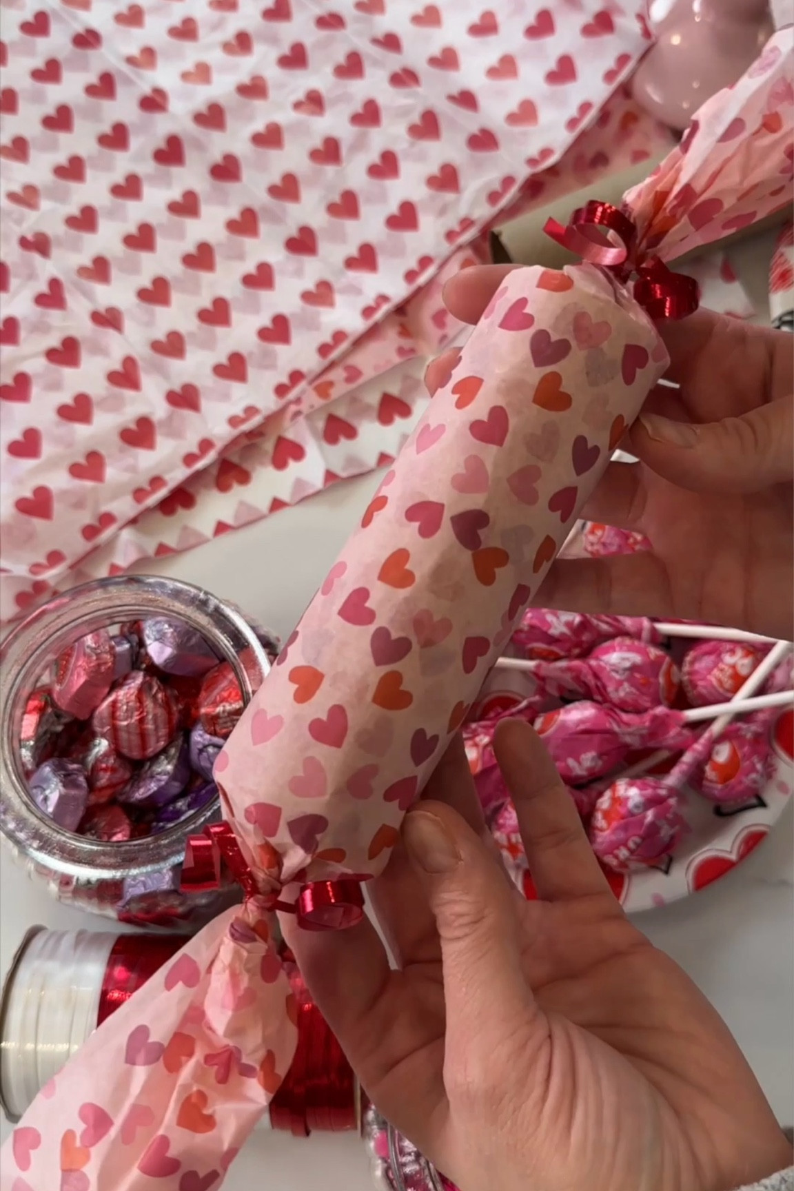 Add a touch of sweetness to your Valentine’s Day with these charming DIY candy-inspired treat rolls! 🎀✨ Repurpose paper towel tubes by filling them with delightful surprises, wrapping them in colorful tissue paper, and securing the ends with ribbon. Perfect for classroom celebrations, gift exchanges, or surprising your little ones at home. Affordable, eco-friendly, and loads of fun! 💖 Save this craft idea for your upcoming Valentine’s projects! 

#ValentinesCrafts #EcoFriendlyDIY #CandyInspiredTreats #ValentinesDay2025 #VDayInspo #ValentinesTreats 

#LTKSeasonal #LTKKids #LTKFamily
