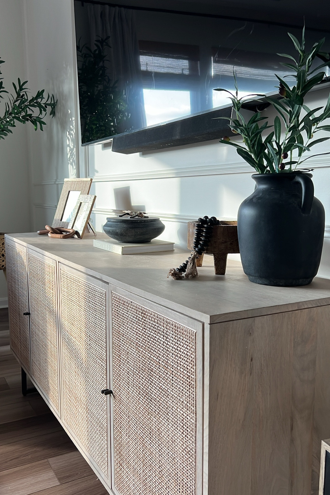 Sideboard styling ✨ 

Organic modern styling, sideboard, wooden frames, wooden beads, coffee table book, anthropology trinket dish 

#LTKhome
