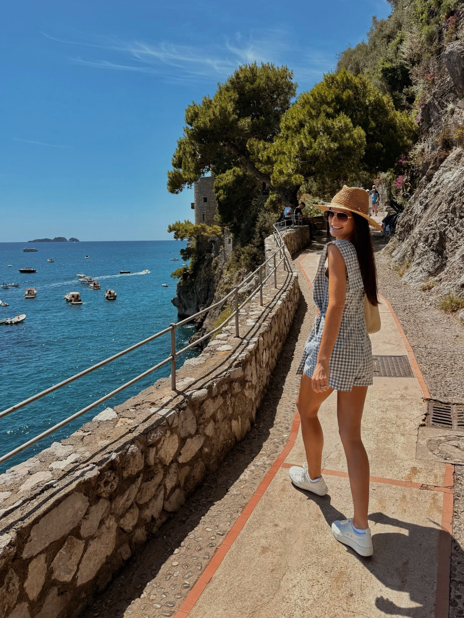 Romper | rancher hat | bucket bag | Anthropologie | daisy print | vacation | Prada | resort wear | Italy | summer dress | casual outfit | straw bag | straw hat 

#LTKStyleTip #LTKItBag #LTKTravel