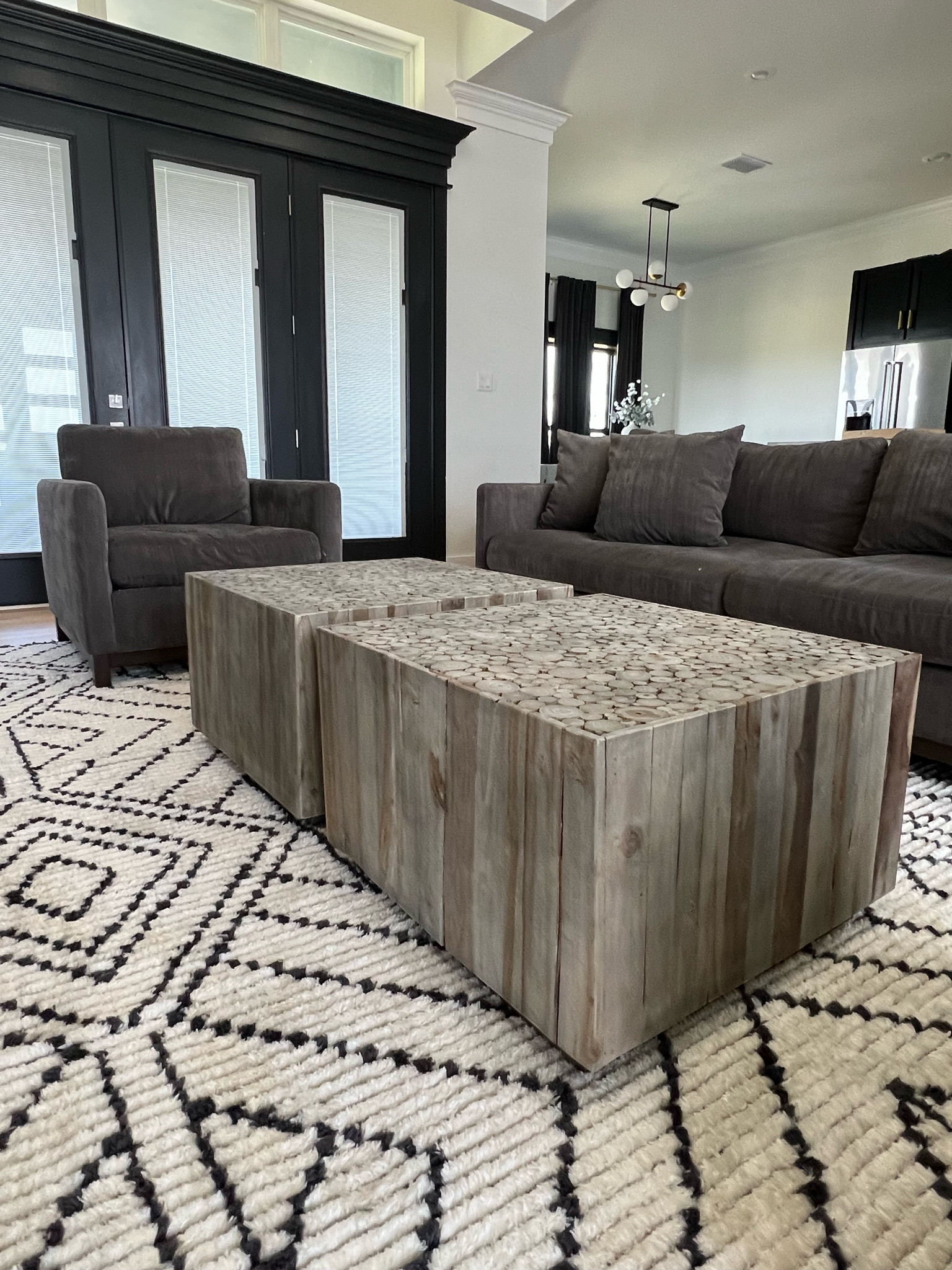 Looking for a neutral rug, then check out geometric rug. This is a 10x14 and it’s more charcoal and beige than it is black and white. It is super soft and my kids love it. 

#gray #charcoalgray #grayrug #beigerug #neutraldecor #neutralhome #graysofa #globelight #globechandelier #islandchandelier #coffeetables #coffeetables #nestingtables #sofa #armchair #clubchair #homedecor #homeinterior

#LTKstyletip #LTKhome #LTKfamily