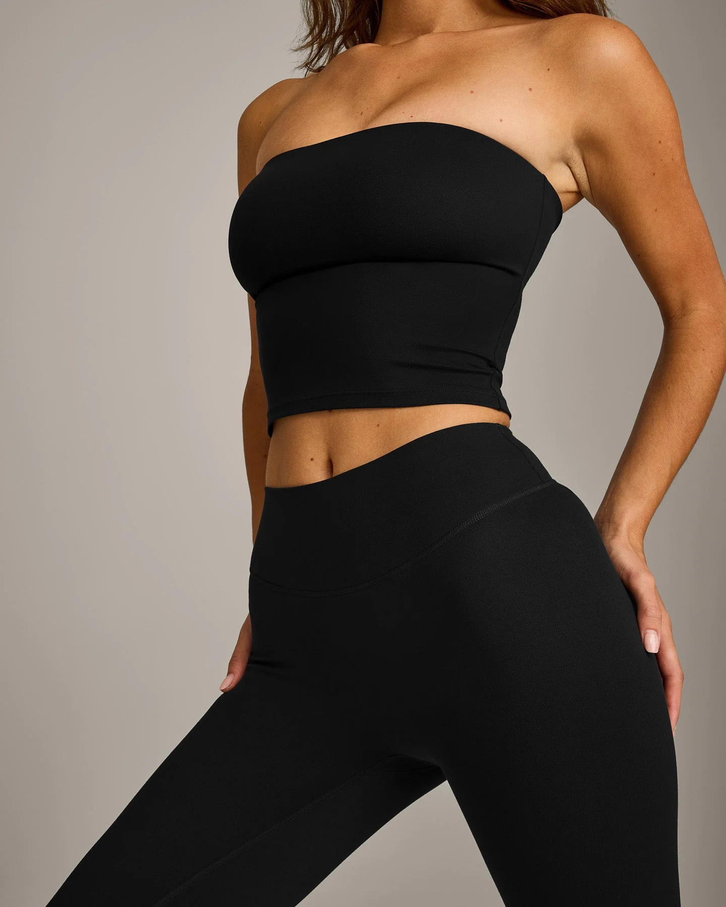 SoftMotion™ Bandeau Mid Tank Top with Built in Bra Shelf with Gray Logo
Black | Oner Active (UK / US)