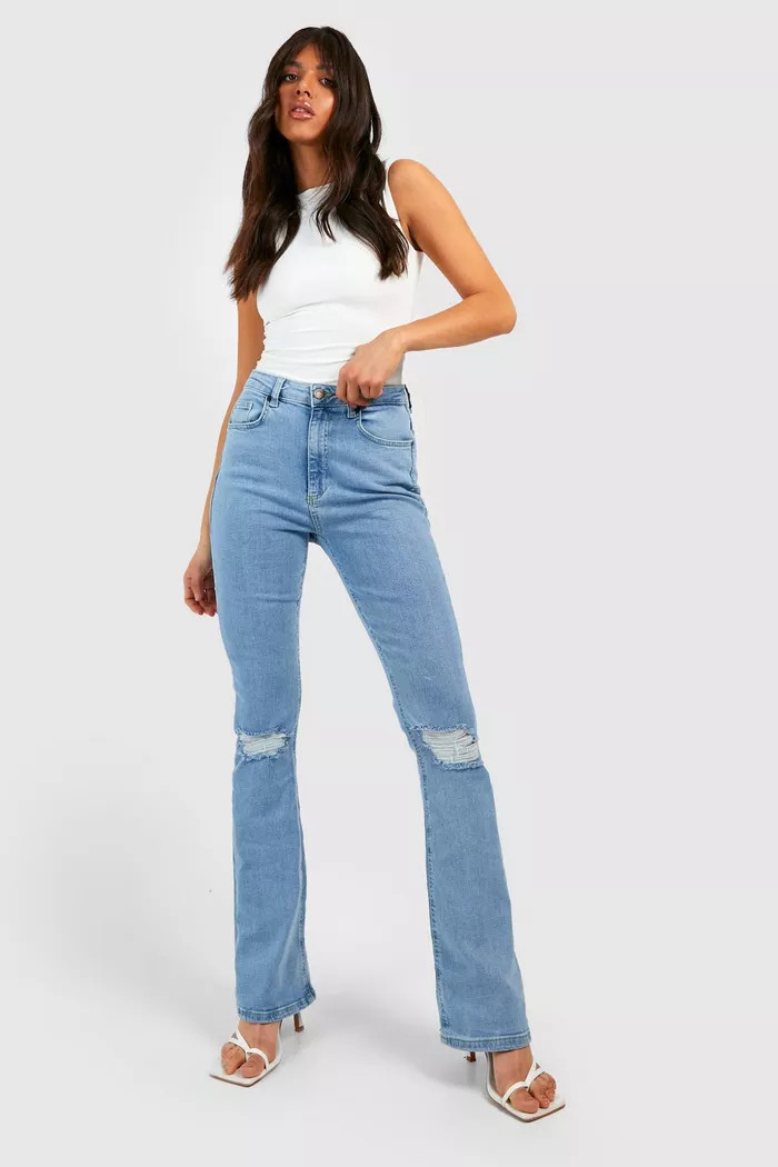 Mid Rise Butt Shaper Ripped Flared Jeans | Boohoo.com (UK & IE)