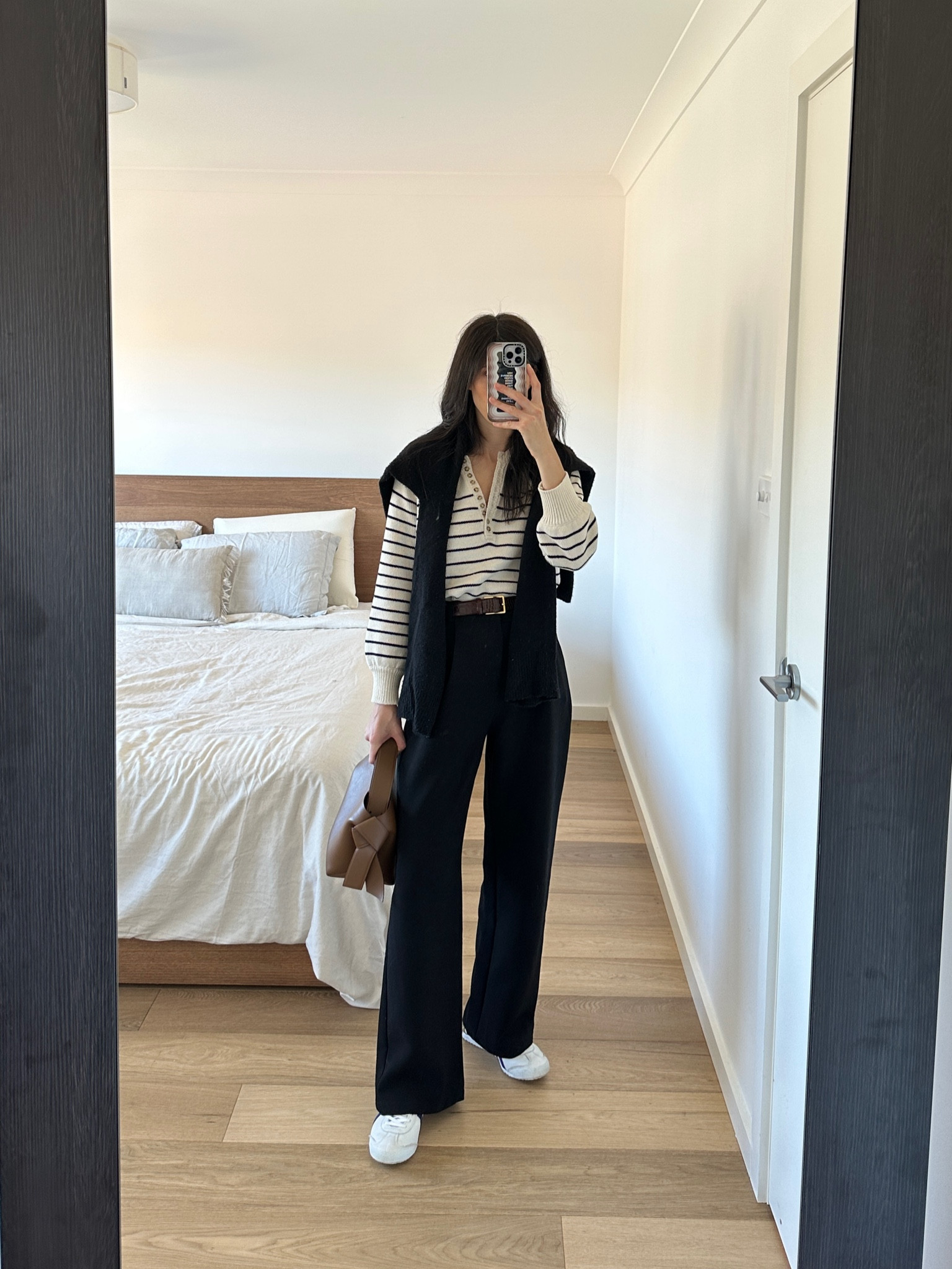 Minimal parisian chic style. Wearing striped knit in size S, pants in size AU8, belt in size 70, and shoes in size men’s US8

#LTKaustralia #LTKSeasonal #LTKeurope