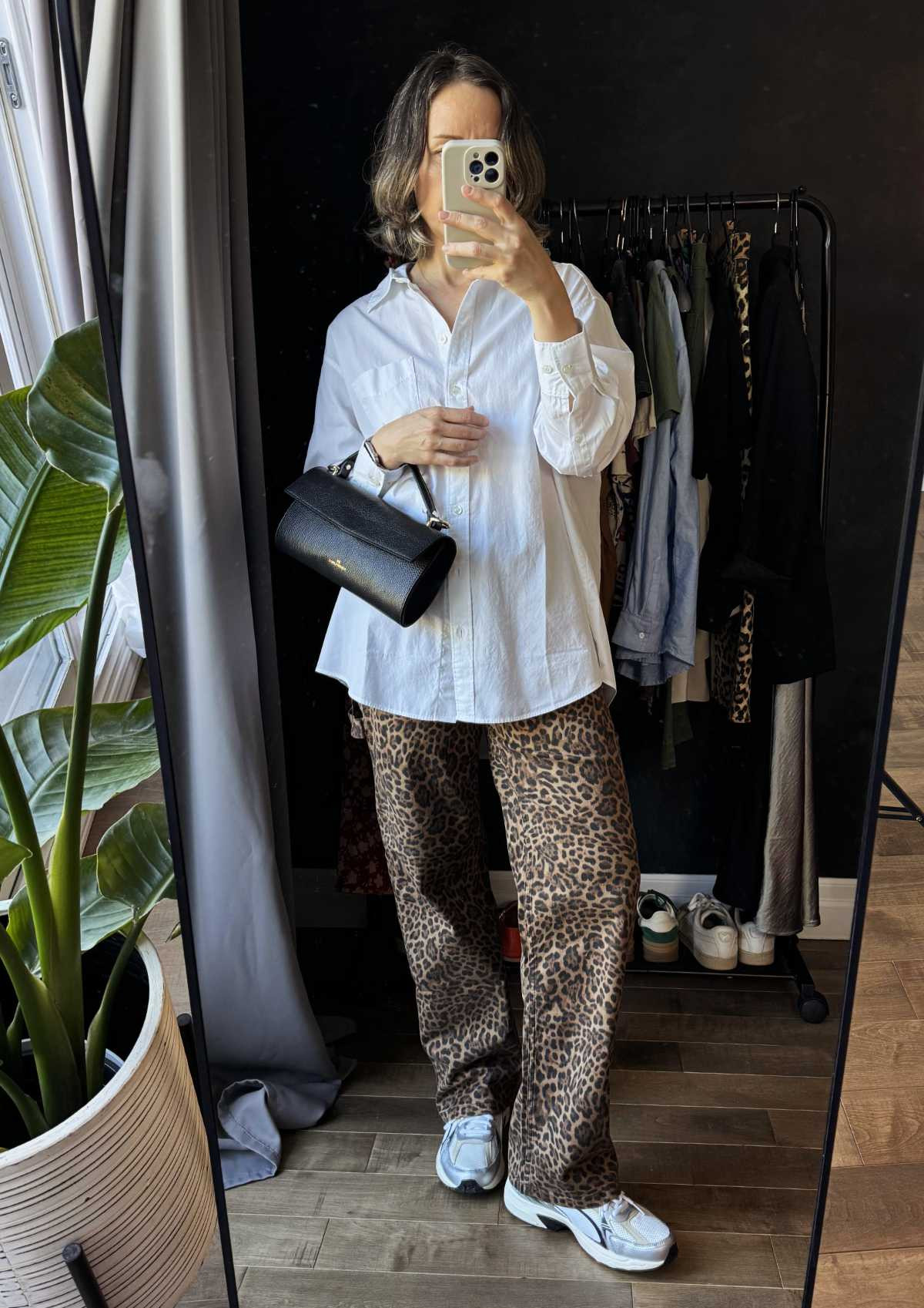 Fall outfit with leopard print pants and white button front shirt 

#LTKOver40 #LTKSeasonal