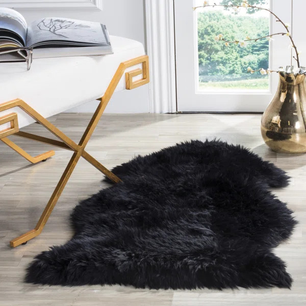 Tateos Sheepskin Sheep Black Rug | Wayfair North America
