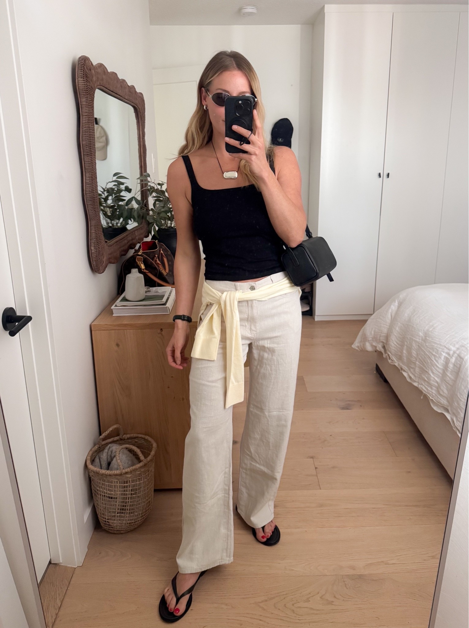 Found the best spring/summer pants from Gap that fit like jeans but feel like light airy linen and they’re on sale! Paired with a super soft Zara tank and Quince lightweight sweater, Reformation leather flip flops and the perfect Poppy Barley shoulder bag. Wearing medium in top/sweater, size 2 in pants.

#LTKcanada #LTKsummer #LTKsale