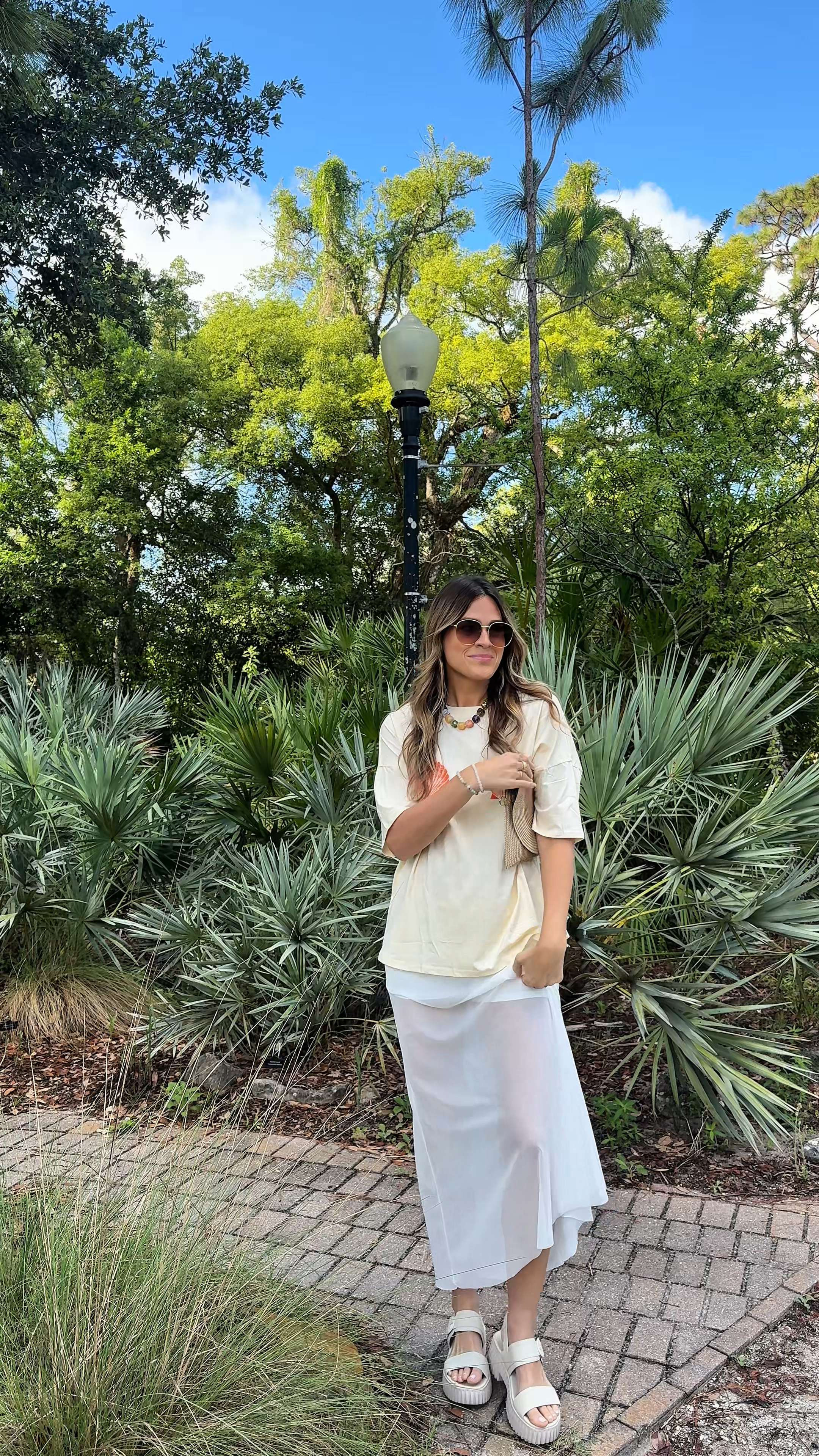 Summer outfit idea I’ll be repeating all season long. An oversized graphic tee layered over a mesh skirt with chunky sandals and a chunky necklace for that effortless casual coastal vibe. Comfy, easy, laid-back, and still feels styled for everyday summer days, beach towns, coffee runs, and casual nights out. Linked the whole look here! 

 #LTKootd #LTKOver40 #LTKSaleAlert