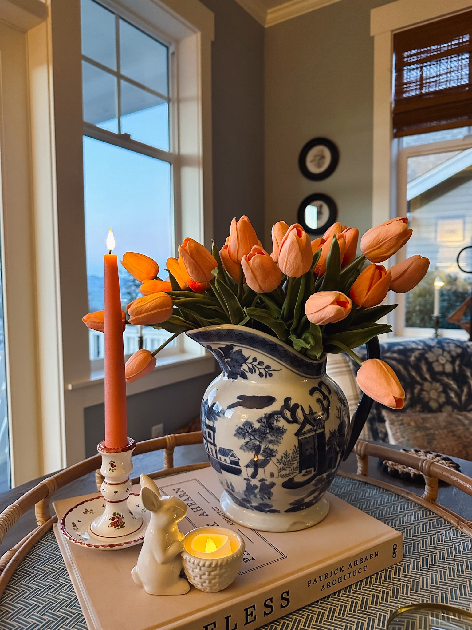 Pink flameless taper candle, faux tulips, bamboo shades, bunny candy dish (I’m using as a little candle holder!), timeless coffee table book 

#LTKSeasonal #LTKhome #LTKstyletip