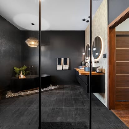 Master Bathroom Retreat 🌿

Where modern design meets natural serenity. This master bathroom blends rich textures, warm wood tones, and organic elements to create a calming space that feels like a private spa. Clean lines and thoughtful details bring a sense of balance while keeping the space warm and inviting.

Every element was carefully chosen to create a bathroom that feels elevated yet relaxing — the perfect place to start and end the day. 🖤

Designer: @design_by_rania 

 #LTKHome