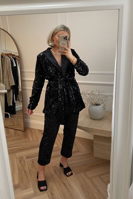 The most incredible festive sparkly suit! Black sequin trousers & blazer both from very, keeping the rest of the outfit simple with black heeled mules & a Pearl necklace from Astrid  

#LTKstyletip #LTKHoliday #LTKSeasonal